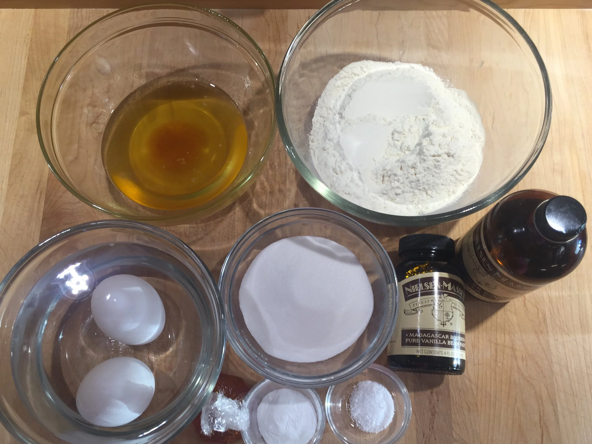 Madeleine Mise en Place. The eggs are in a bowl of hot water so that they warm up a little - 5 minutes and the chill is gone. They will whip up better if they are not ice cold.