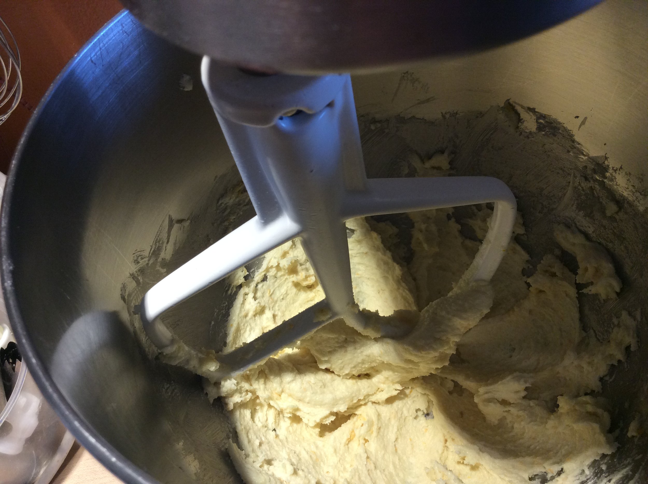 Cream butter, sugar and vanilla (and optional citrus zest) until smooth 2-3 minutes