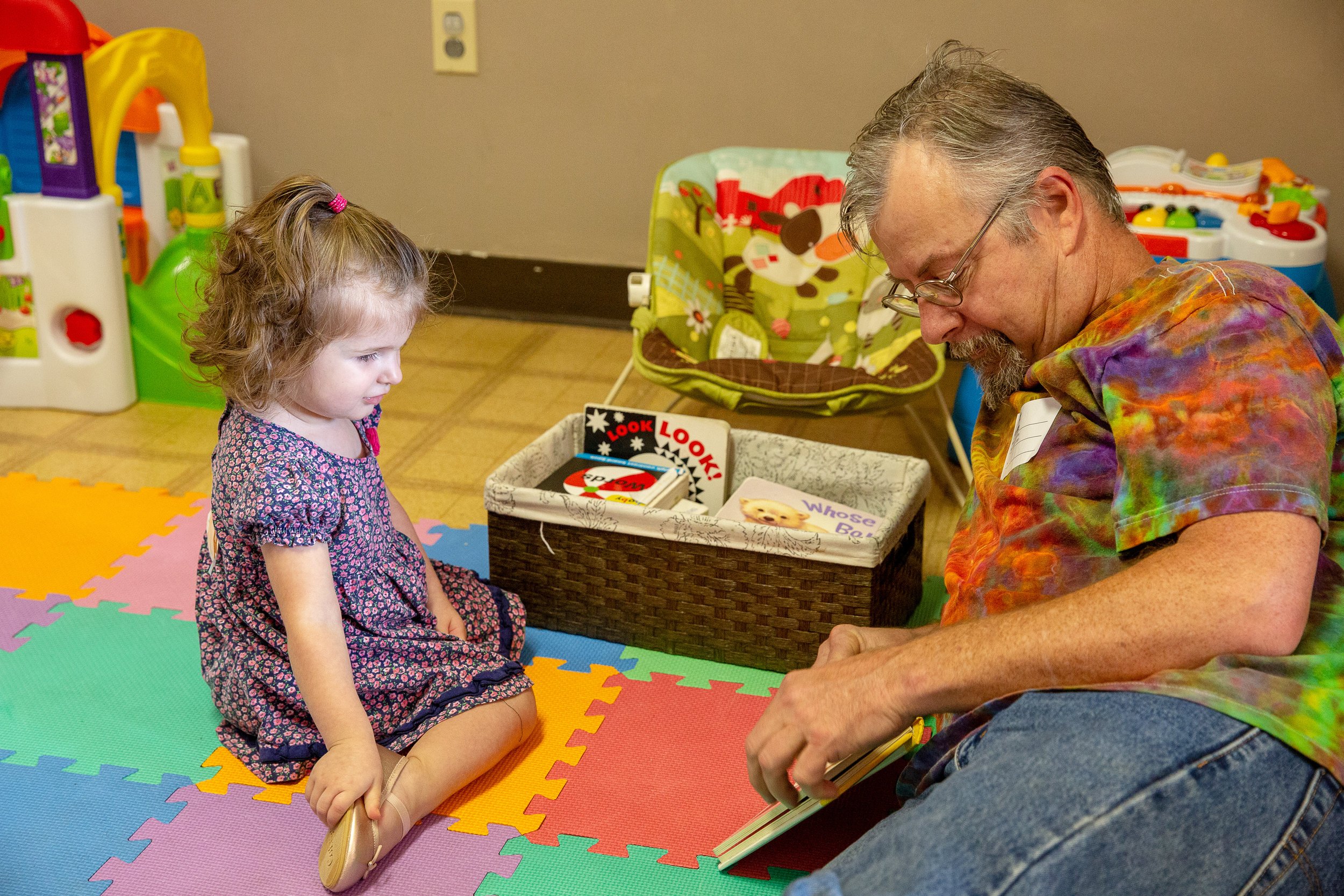 Karis Kids volunteer serving in the classroom