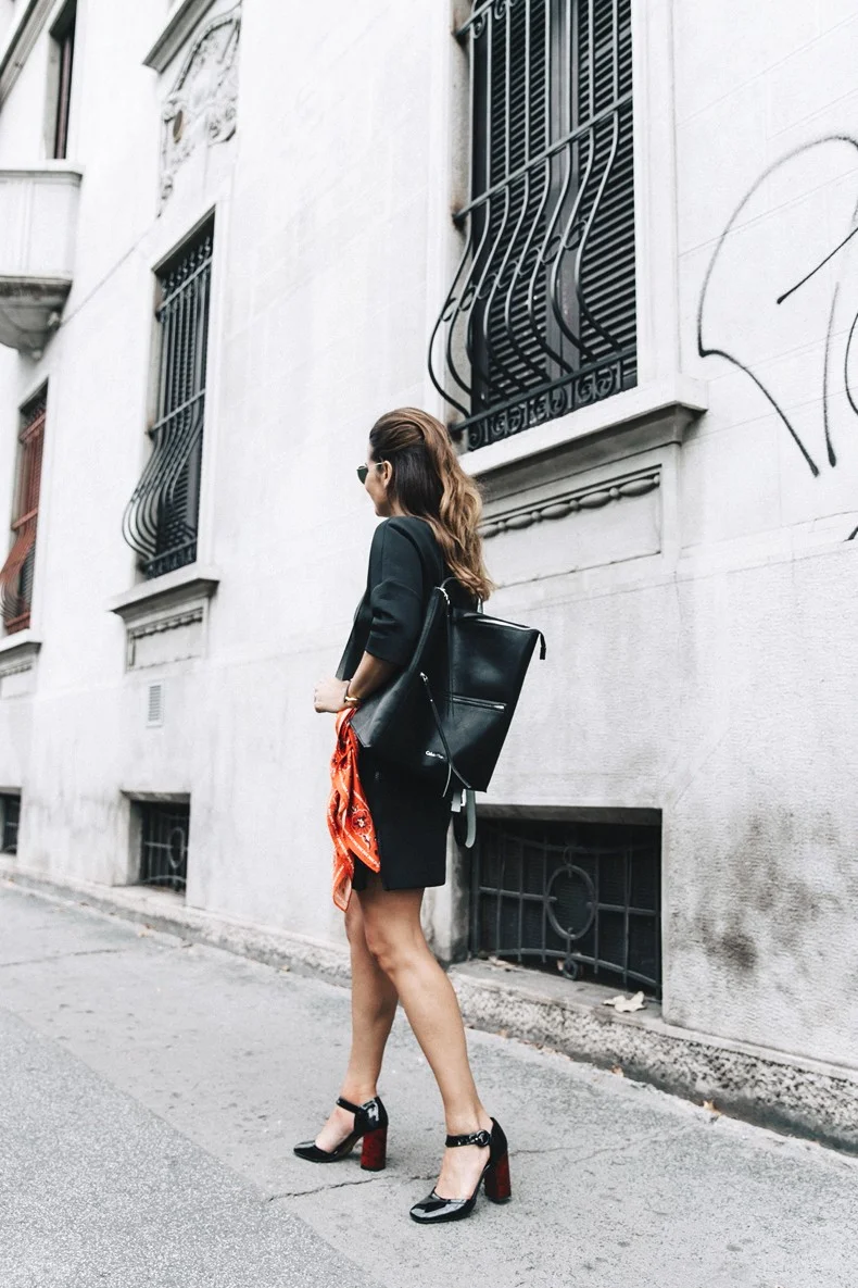 A unique heel shape and red velvet color adds an extra pop to this adorable pair; image via
