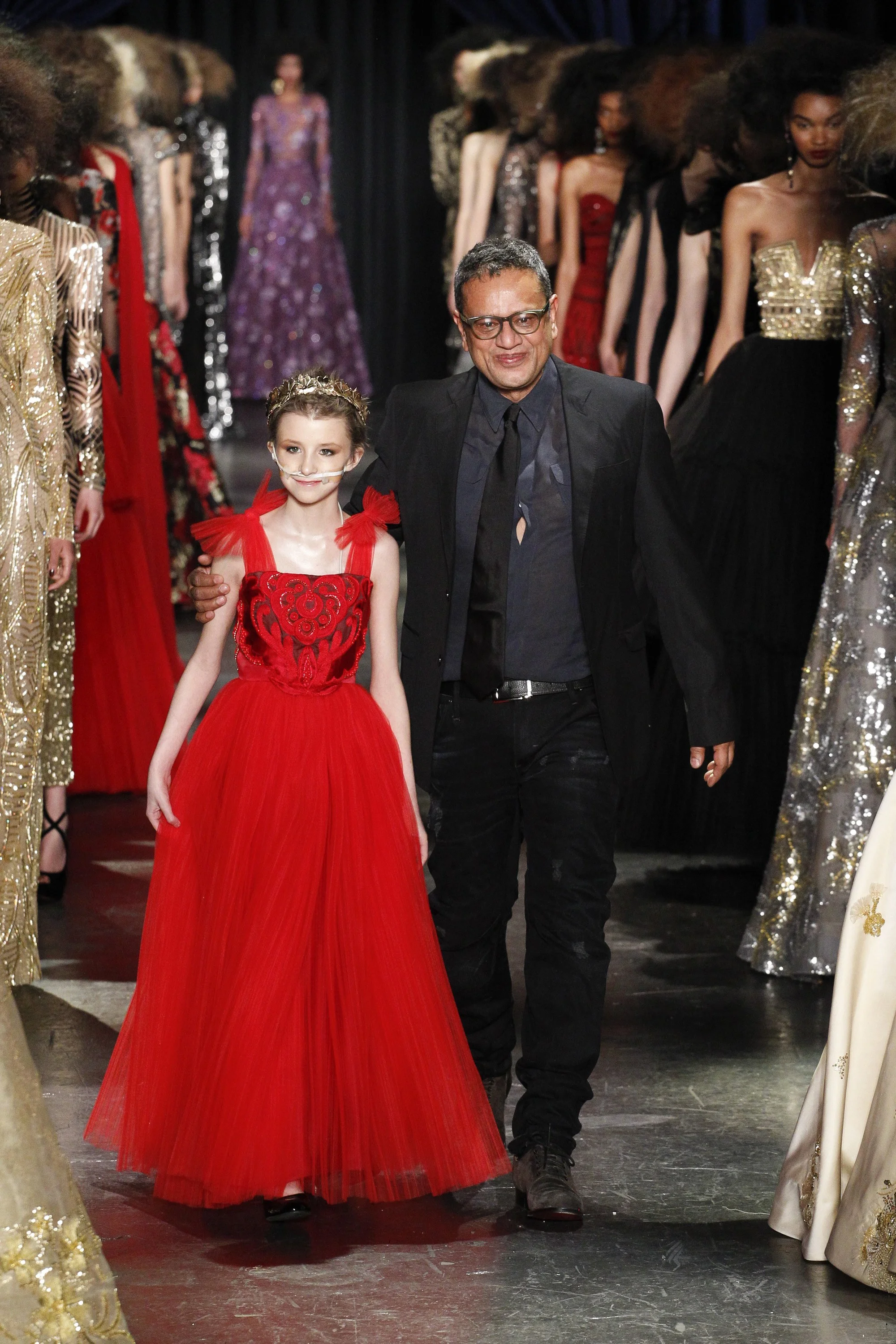The designer with Trinity Faith Moran (in Naeem Khan); image via