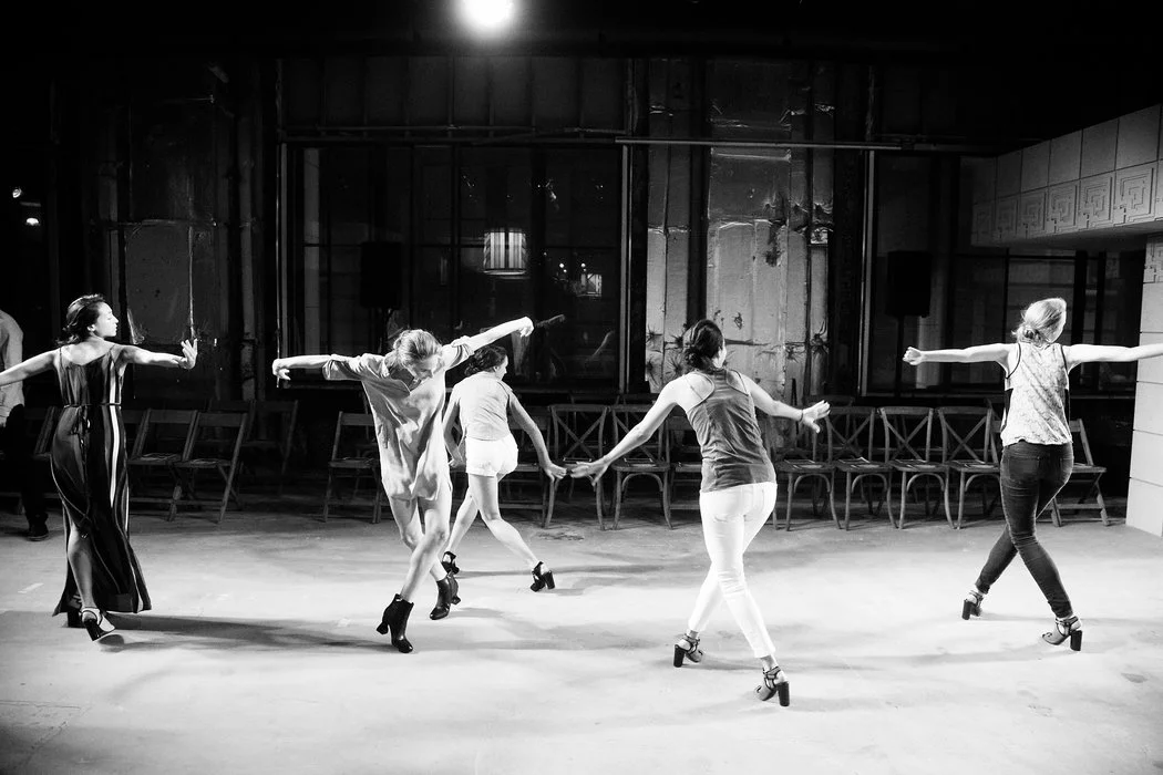 Dancers from the NYC Ballet rehearsing for the show; image via