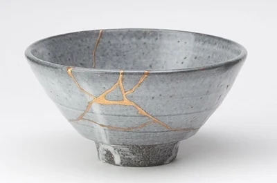 "Kintsugi, or kintsukuroi, is a Japanese method for repairing broken ceramics with a special lacquer mixed with gold, silver, or platinum. 