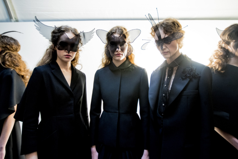 Dior models don semi-sheer insect masks; image via
