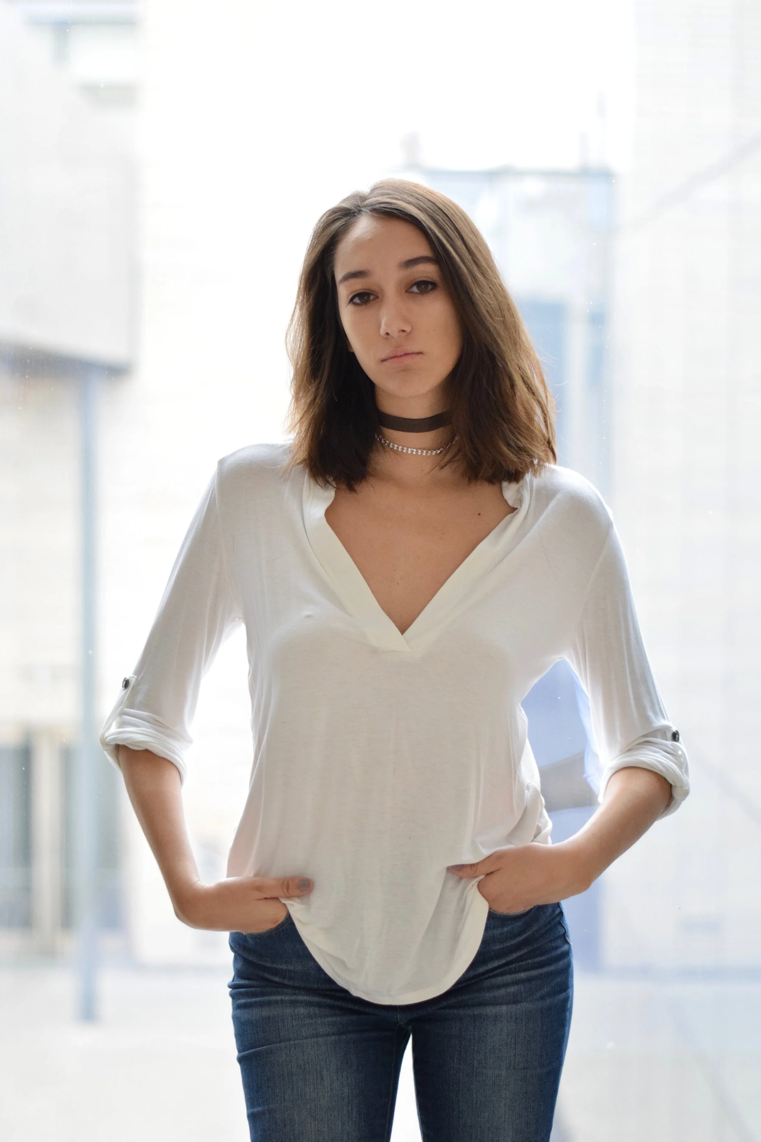 Gabrielle is wearing The Kate with a crystal choker.