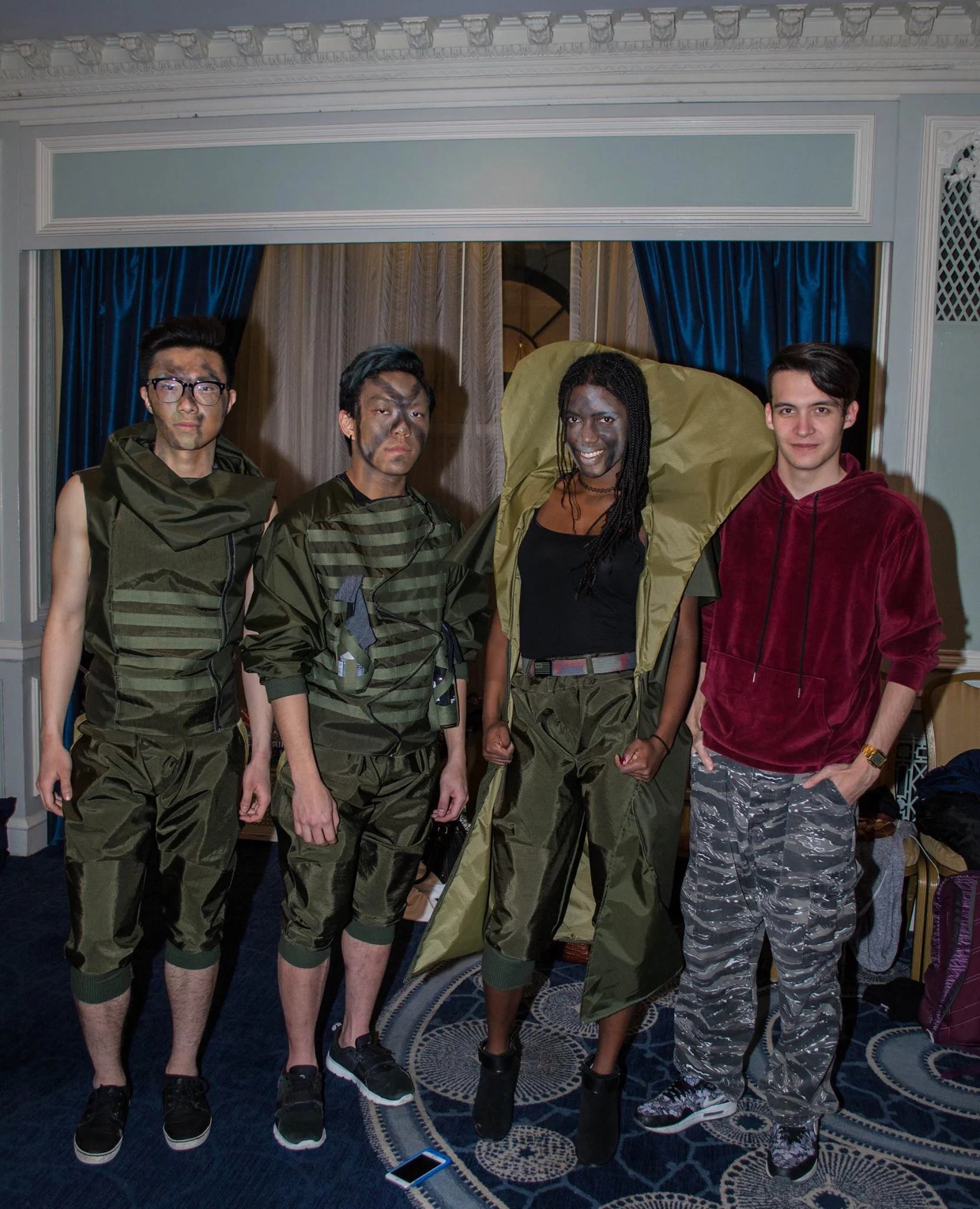 "Hypermasculinity" by Kishin Kato. Left to Right: Rayen Wang, Jonathan Lim and Kaela Bynoe modeling looks from Kishin's collection. Photograph by Kwambata Ngatia.