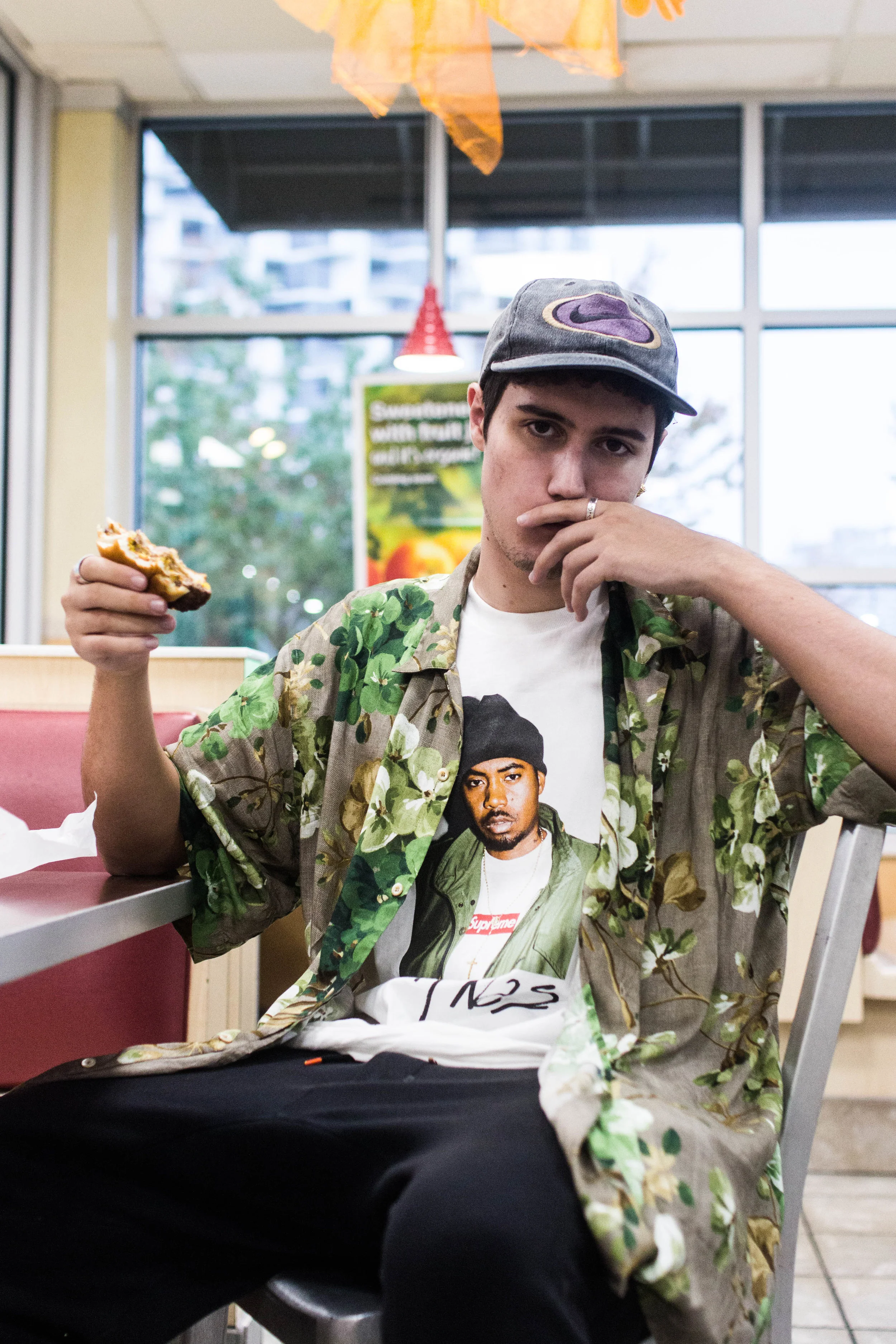 I’m wearing one of my favorite tees, the supreme Nas tee, and a Gucci floral silk shirt. On my feet I have my brand new Air Max 1’s, OG gym red colorway.