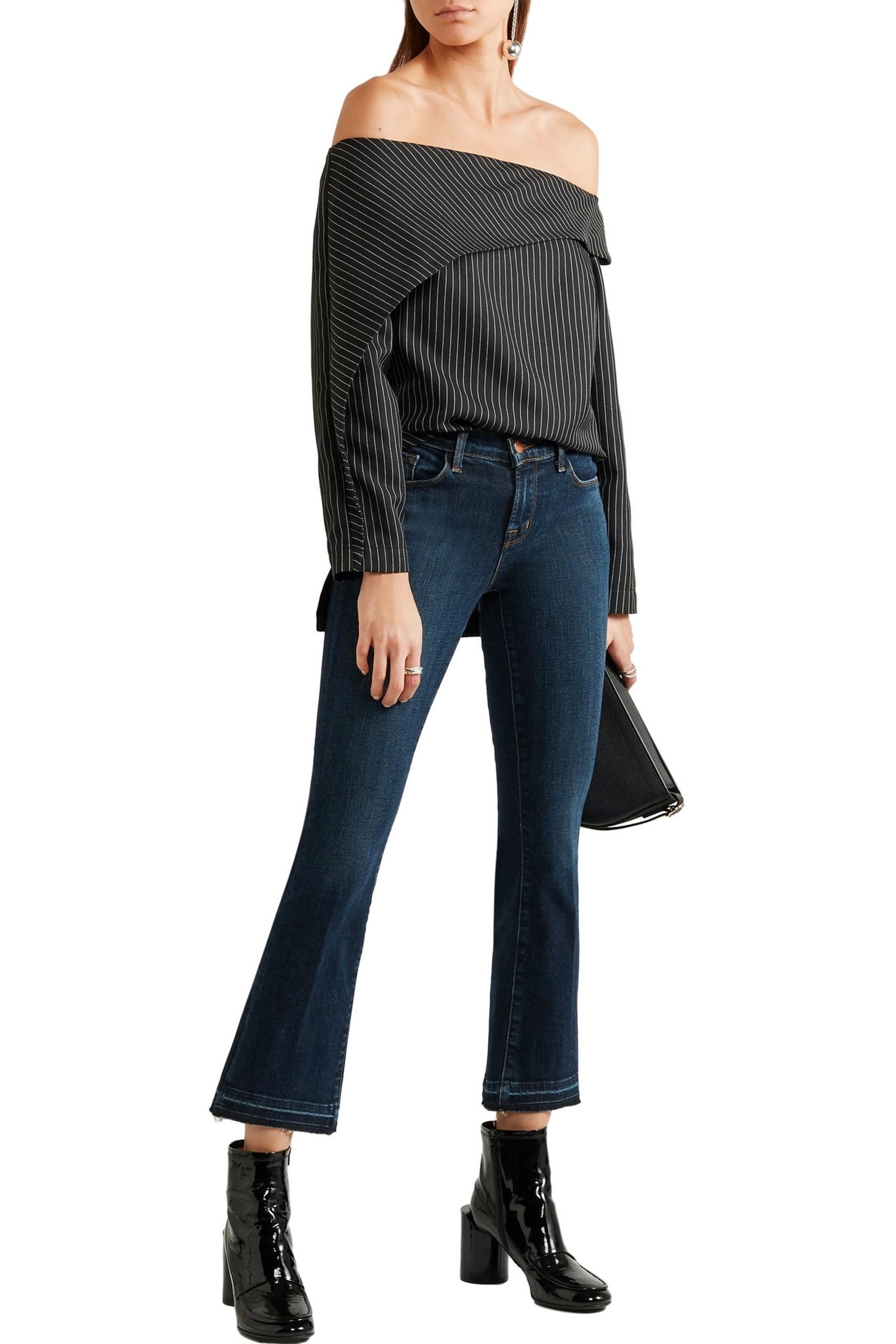 off-shoulder shoulder shirt +&nbsp;bootcut jeans  Image  via  