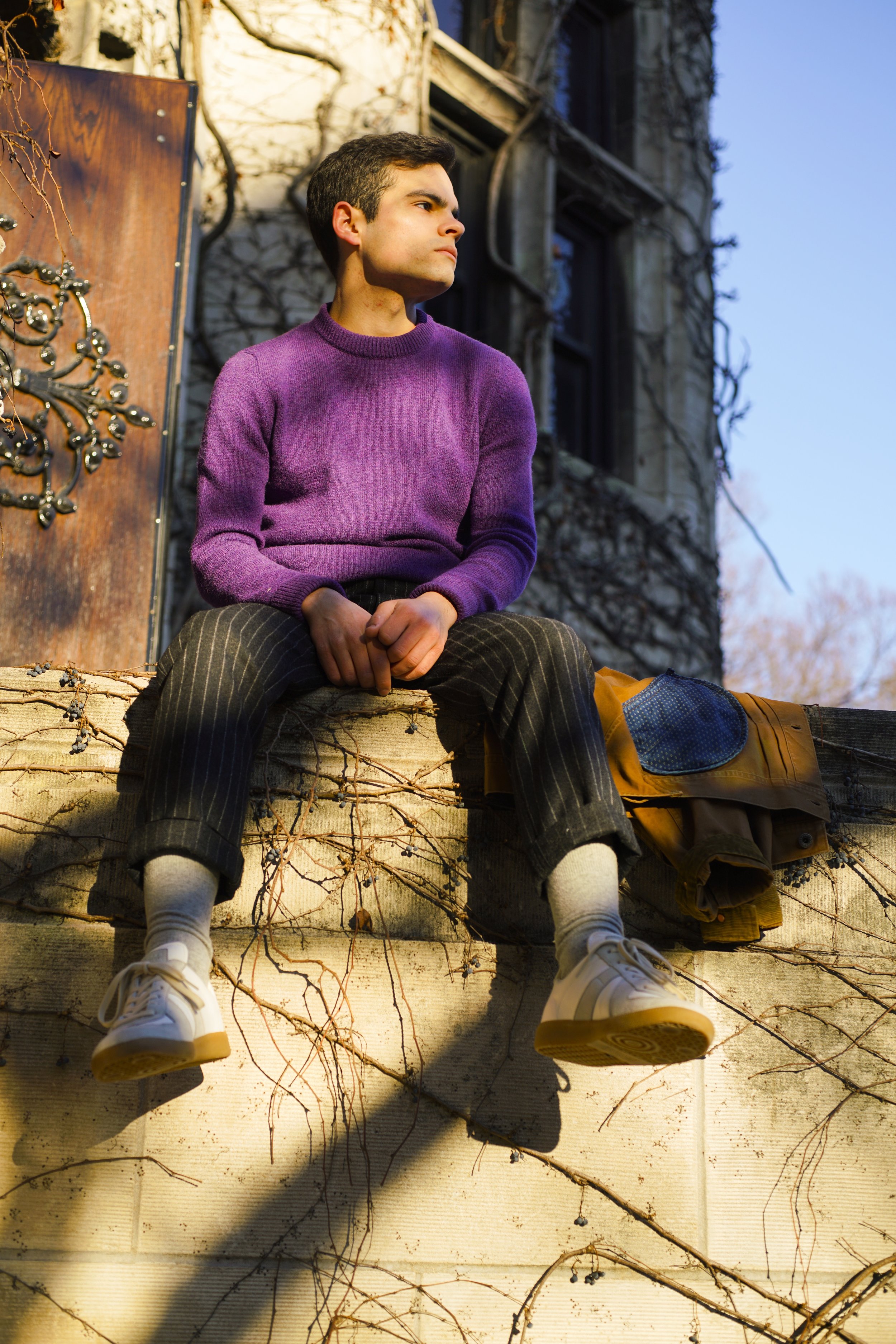 looking off into the distance purple sweater.jpg
