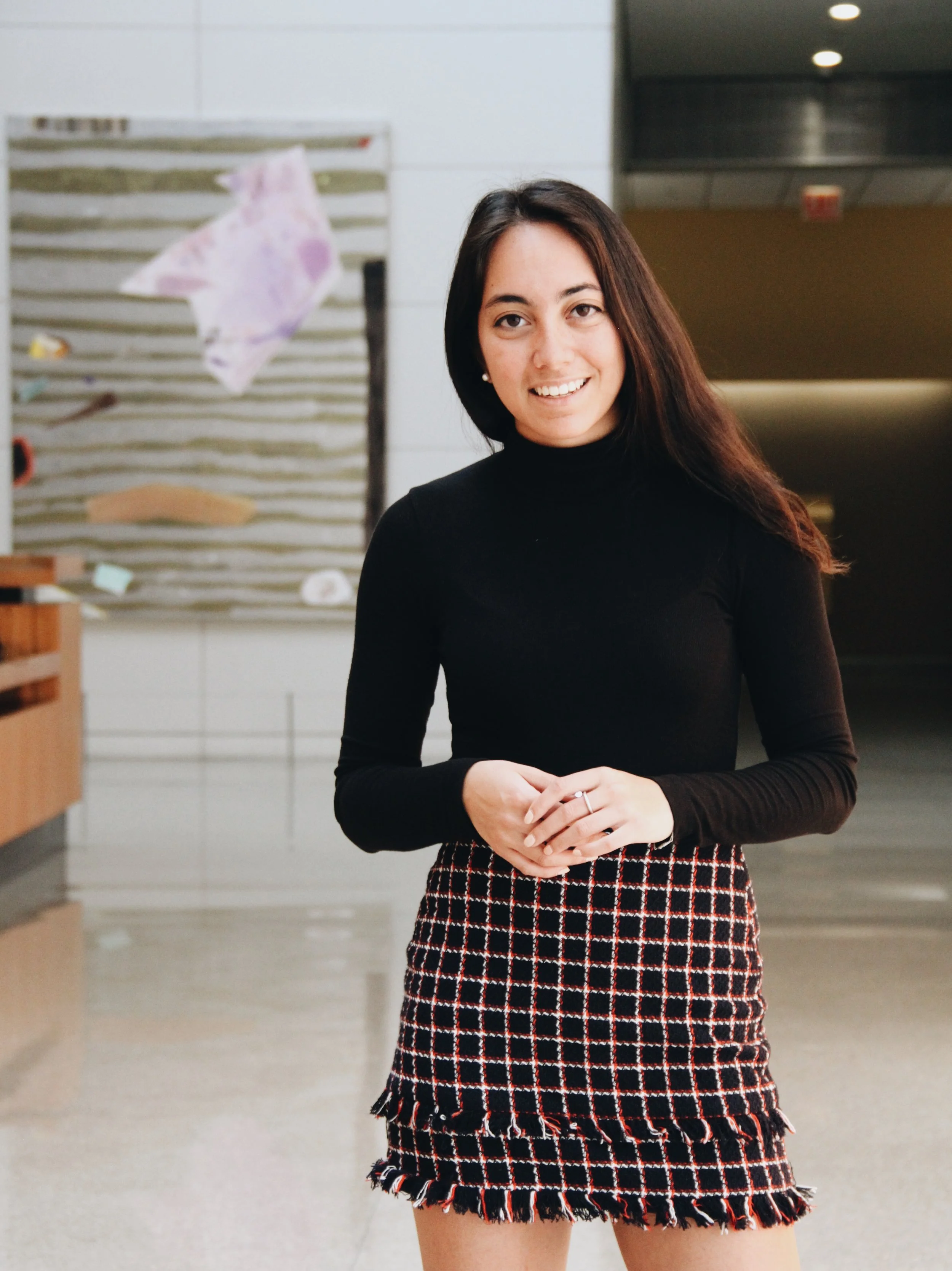I’m wearing a combination of Aritzia, Zara, and Vince. Both tops are from Aritzia as are the black pants. The plaid skirt is from Zara, and the shoes are Vince.