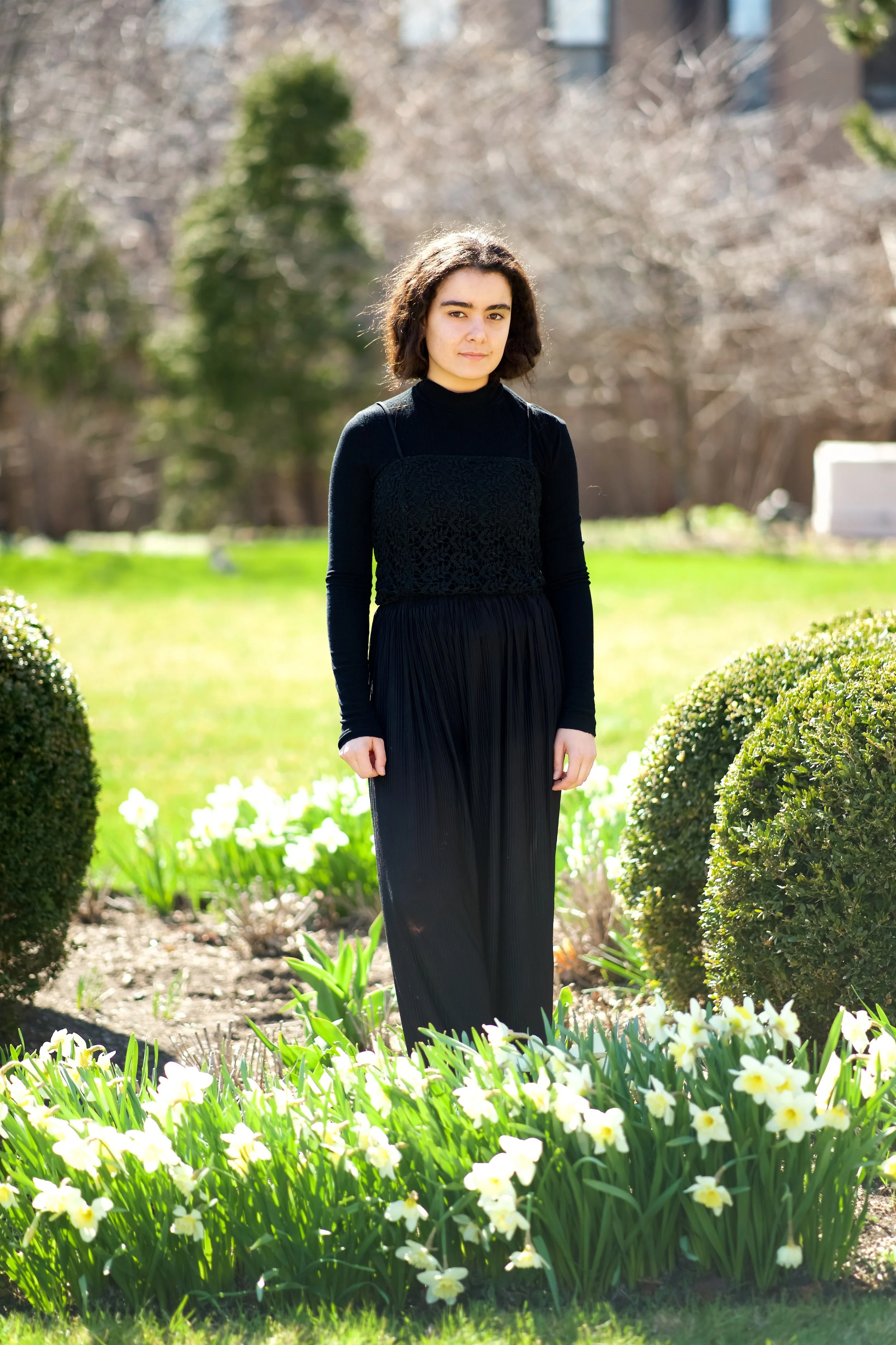 For this look, I am wearing a Worthington wool coat (thrifted), a Zara Basic ribbed mock neck long-sleeve shirt, a black lace top passed down from my mom (probably custom-made) and Uniqlo wool cropped wide-leg trousers.