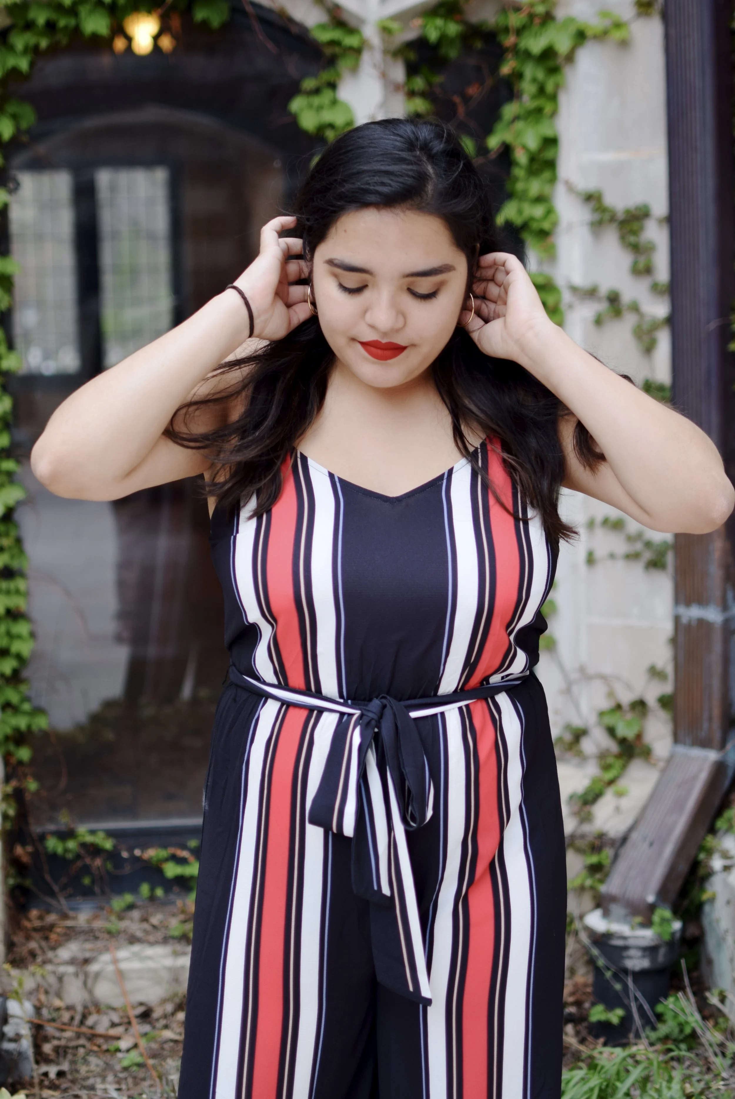 I purchased this jumpsuit and hoops from Akira and my go-to nude block heels are from DSW. As for my makeup, it’s a mix of high and low end products all thanks to Benefit, Fenty, and Colourpop.