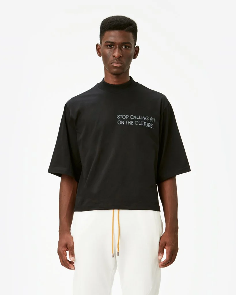 Titled the “911” Tee, this T-shirt is just one example of the many ways in which Pyer Moss speaks about policy brutality against people of color, namely African Americans. Image via.