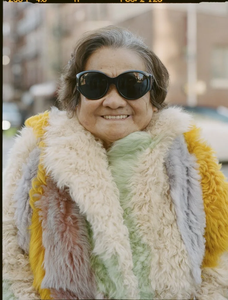 Liang’s Paw Paw modeling a Sandy Liang multicolored shearling coat.