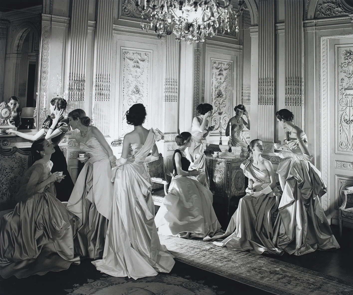 Cecil Beaton’s image of ladies wearing James Charles gowns via .