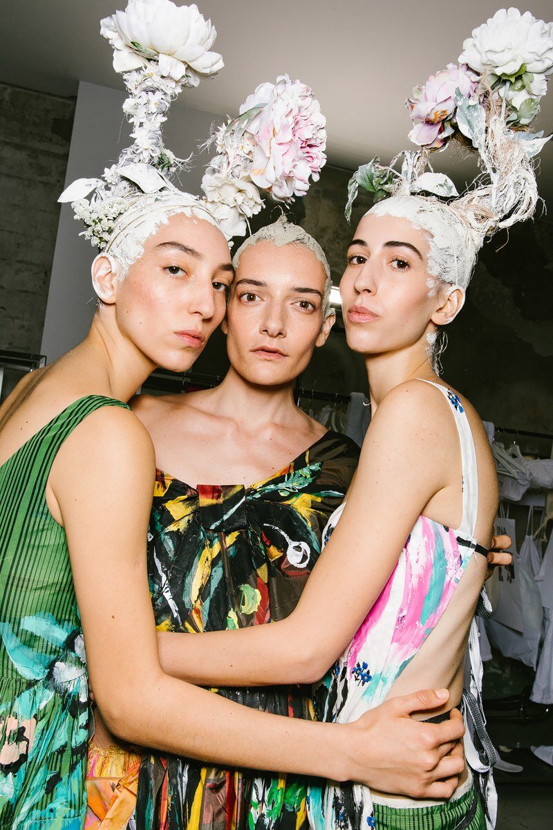 Designers planted many blossoms this season, among other places, Francesco Risso planted them in his models hair at Marni. Image via