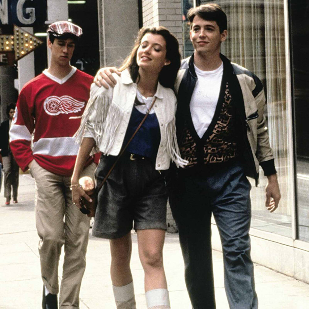 Sloane (Mia Sara) pictured with Ferris (Matthew Broderick) and Cameron (Alan Ruck). Image  Via