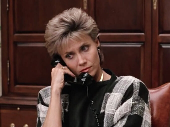 Katie Bueller (Cindy Pickett) epitomizing 80’s business casual. Image  Via