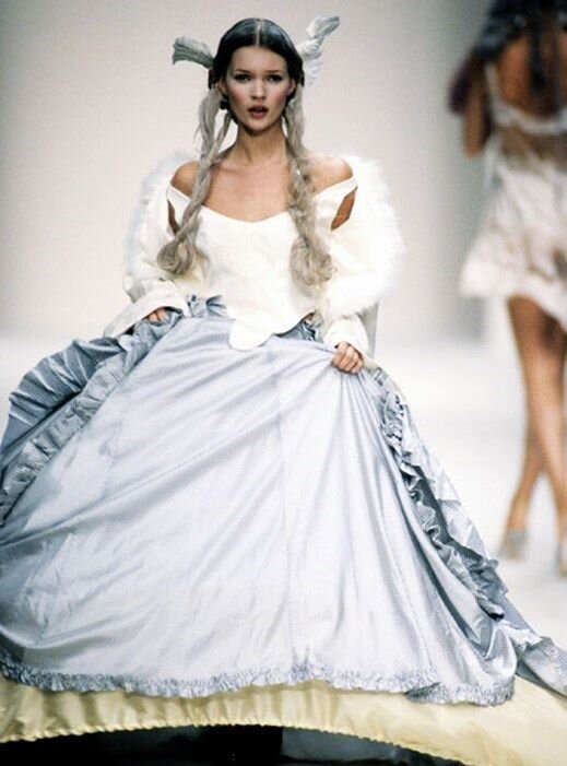 Kate Moss walking the runway for John Galliano’s Spring/Summer 1994 show. Image  via