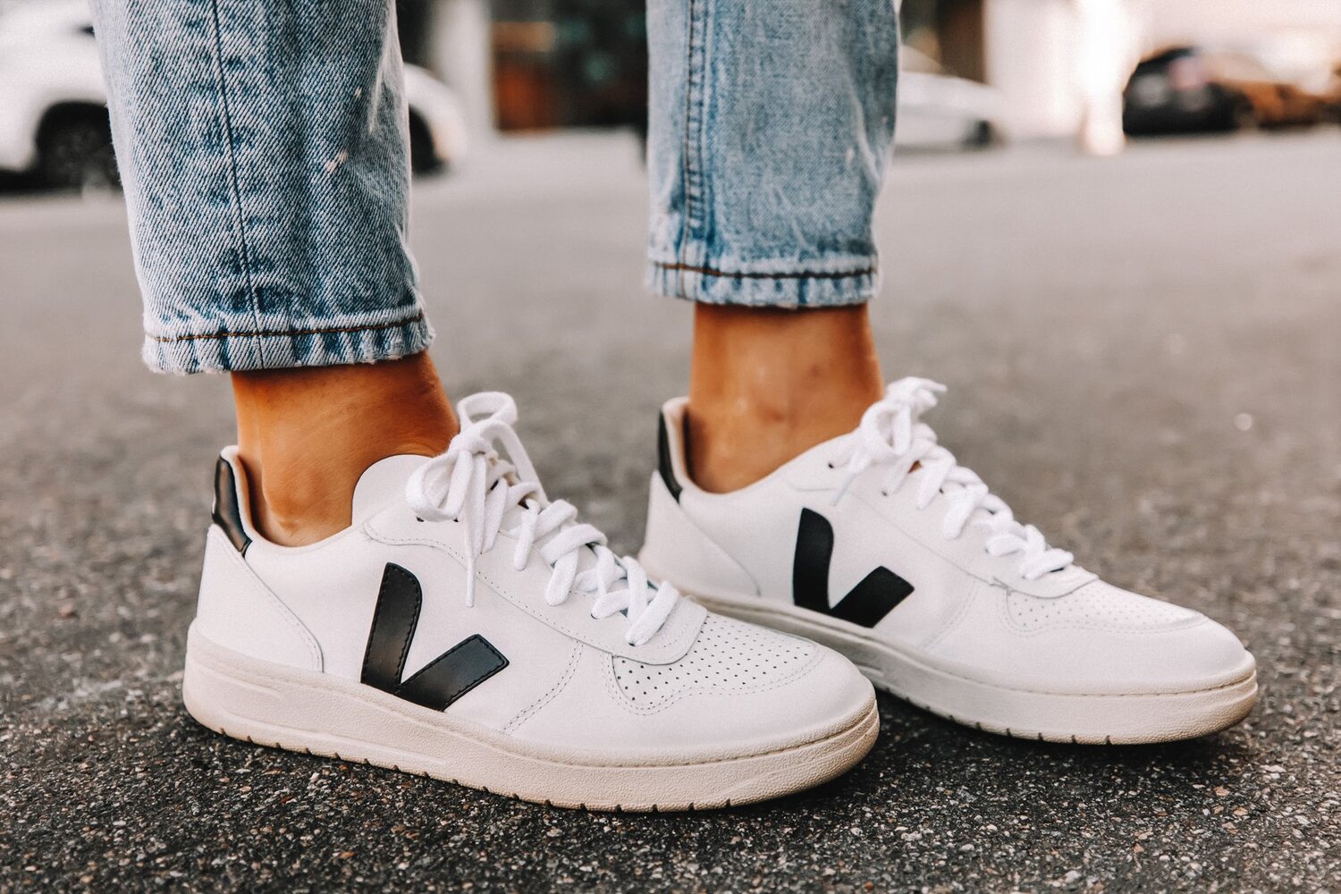 The wildly popular VEJA V-10 is available in a lovely array of materials and color ways, and is perfect for everyday wear. Image  Via