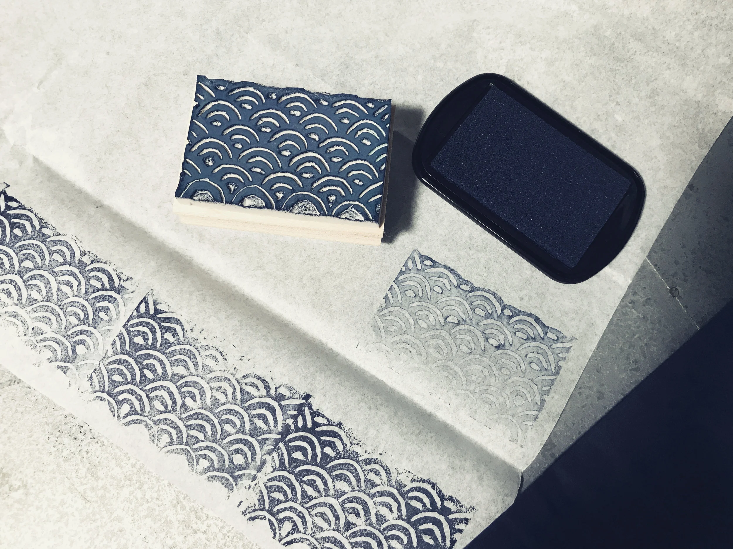 Navy ink on white tissue is reading better.