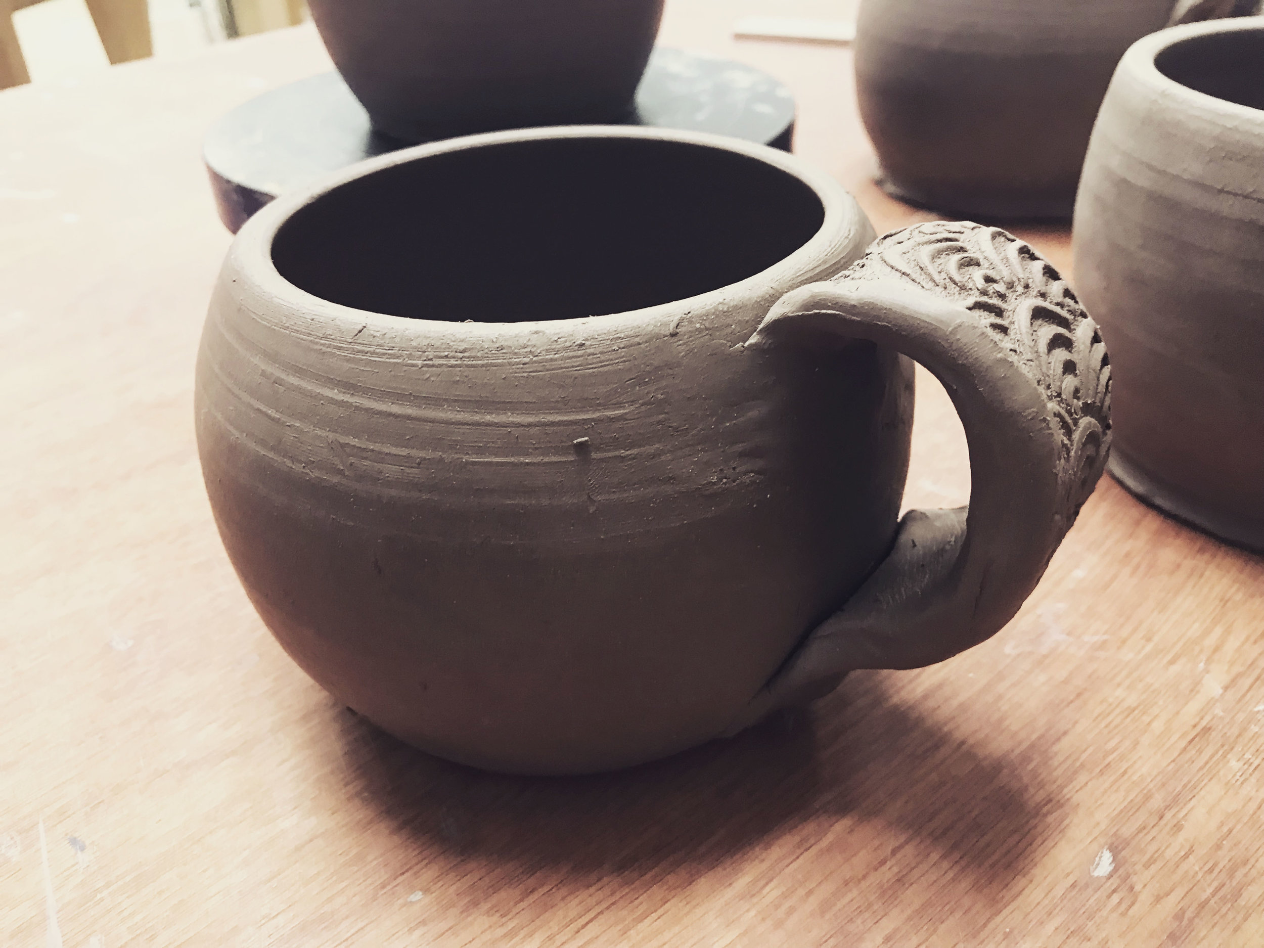  The other ones weren't so bad. Here's one where I really tried to blend it into the shape of the mug. 