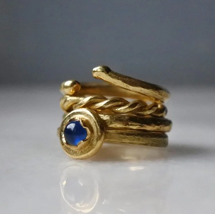 Pile of gold rings on top of each other