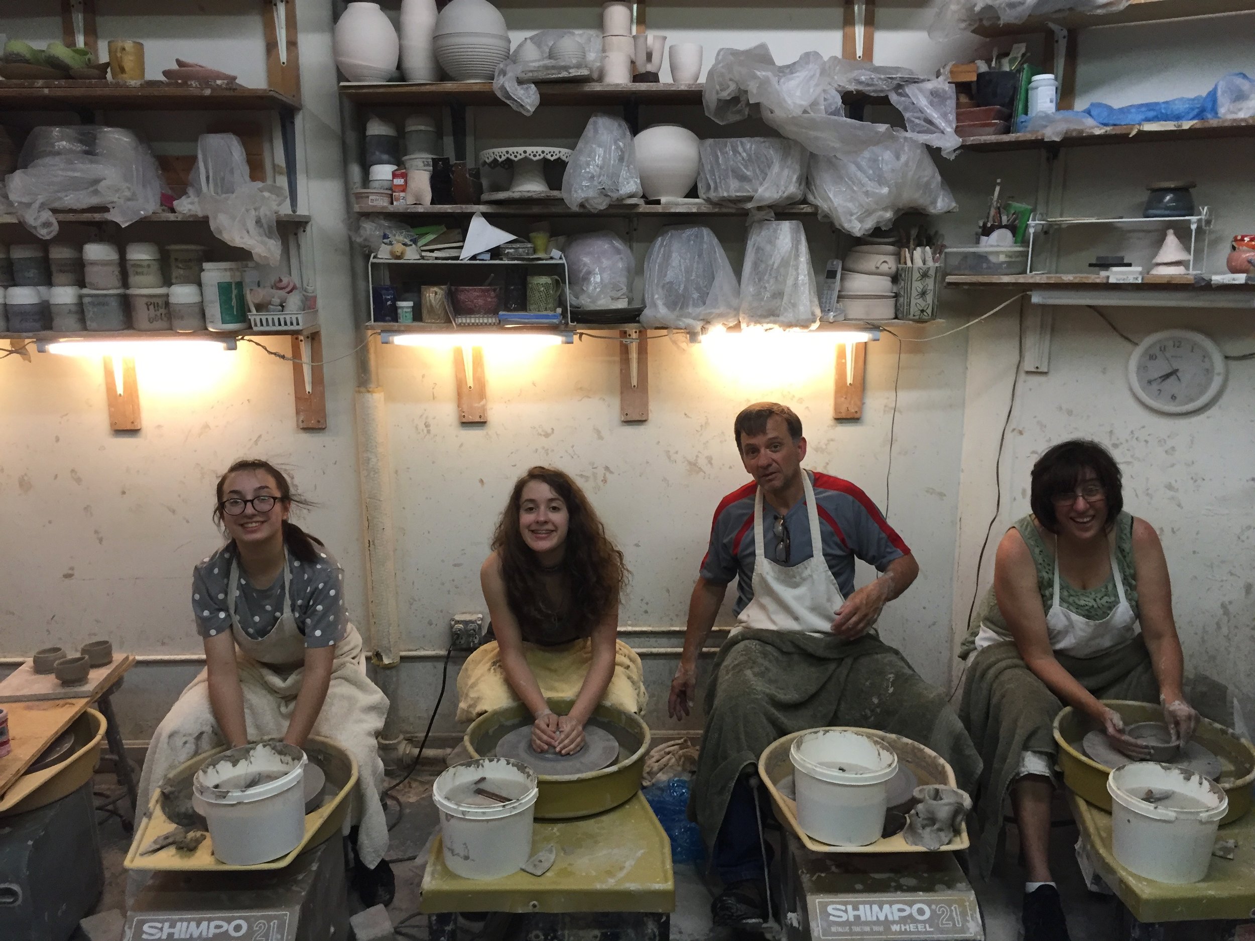 Family doing pottery wheel together!