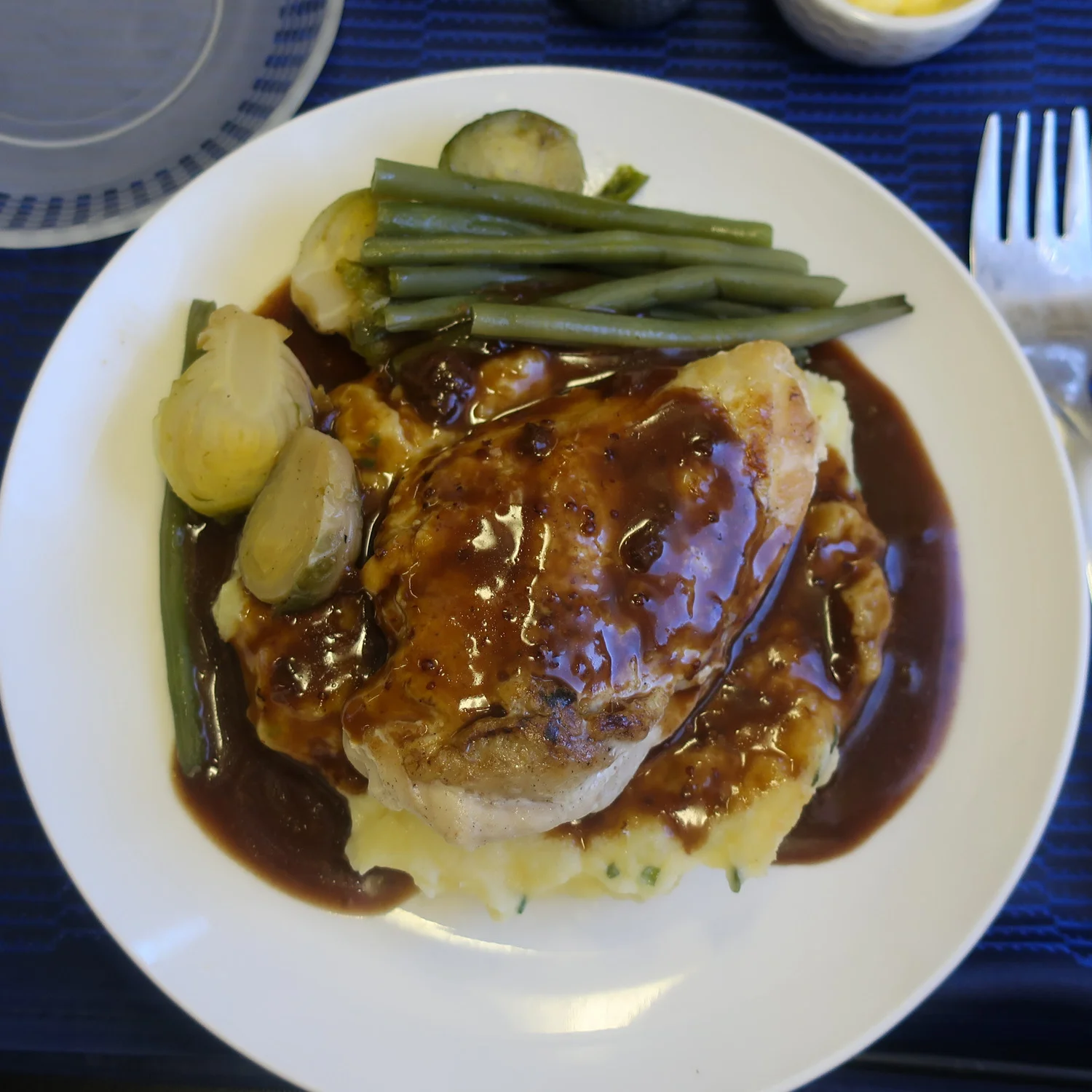 Seared Chicken Breast with Chive Mashed Potatoes - United Polaris Photo: Calvin Wood
