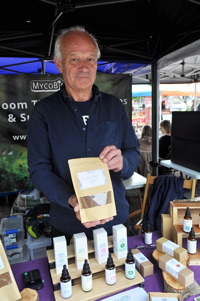 Huw on market stall - Huw Griffiths.png