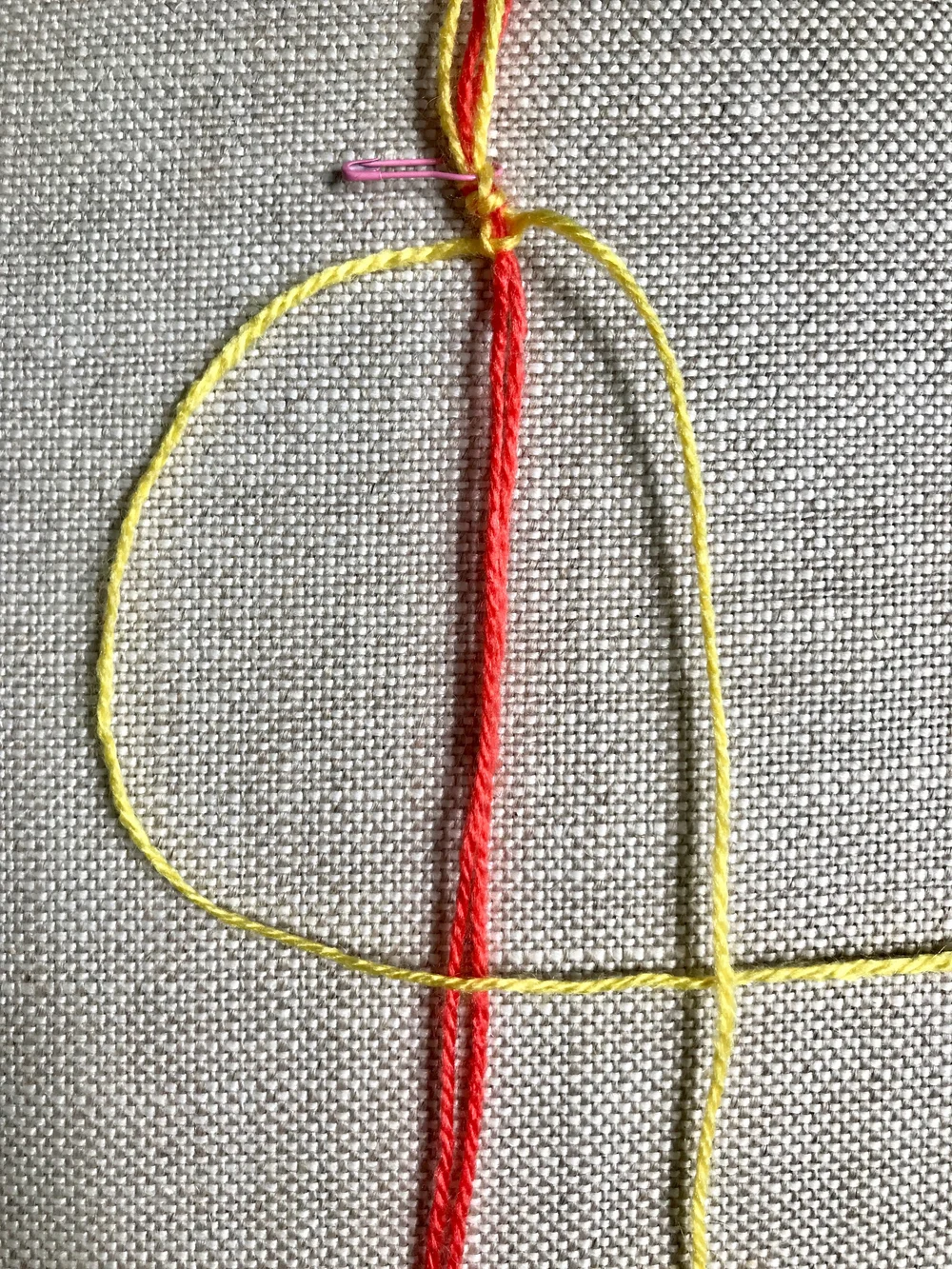 7. To work the second half of the square knot, this time weave the left most thread OVER the two center threads and UNDER the right most thread.
