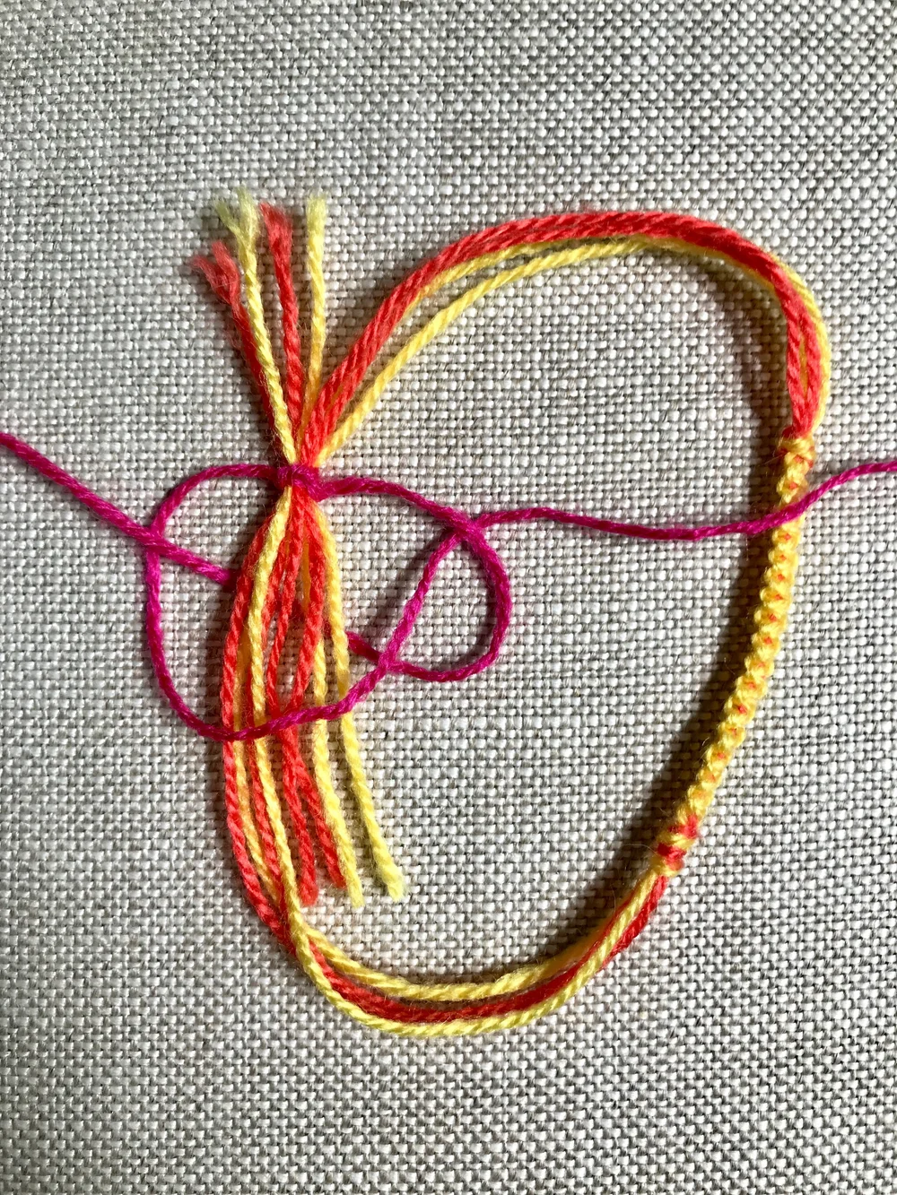 18. Complete the square knot by weaving the right most thread UNDER the center bundle and OVER the left most thread.
