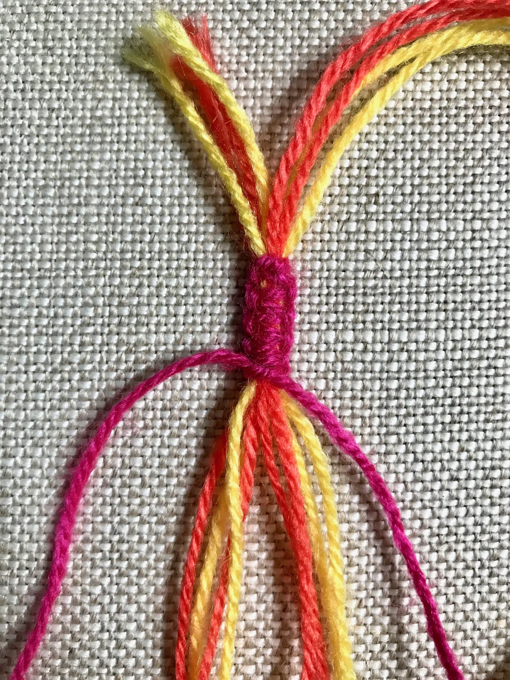 19. Continue working square knots until adjustable closure measures approx .75”/2cm. Tie off ends with a regular double knot.