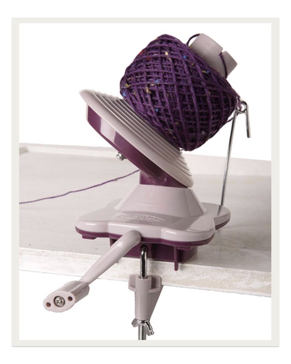 What would a swift be without a ball winder? While these are usually quite expensive, this Knit Picks winder is affordable and attractive and also easily clamps onto the side of a table for quick use.