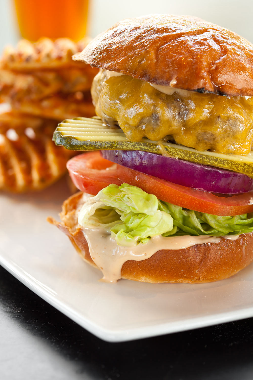 Food_Photography_Cheese_Burger_lettuce_onion-tomatoe_pickles-bun_waffle-fries-criss-cut.jpg