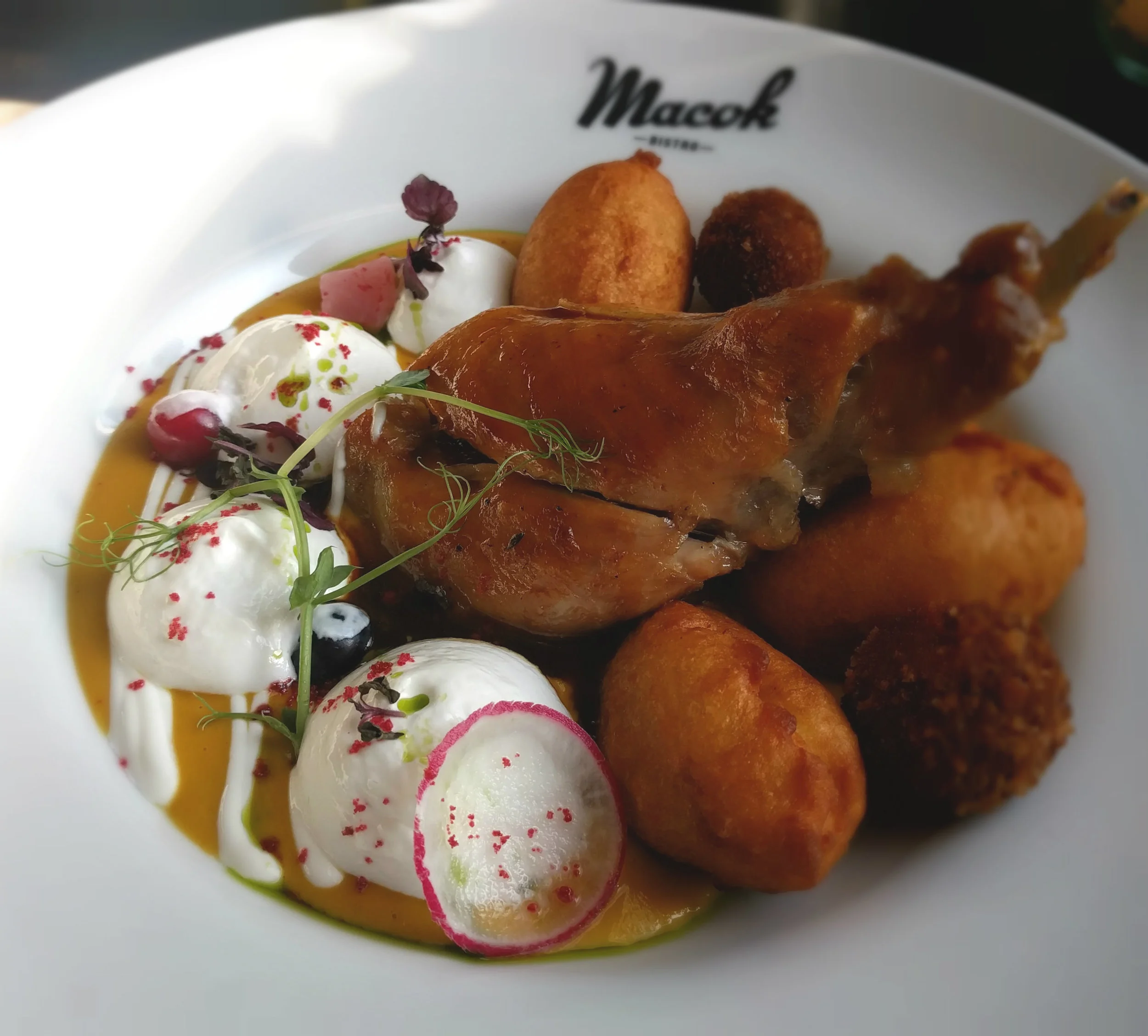 Toasted rabbit roast with liver crisp, vegetable sauce and potato donut