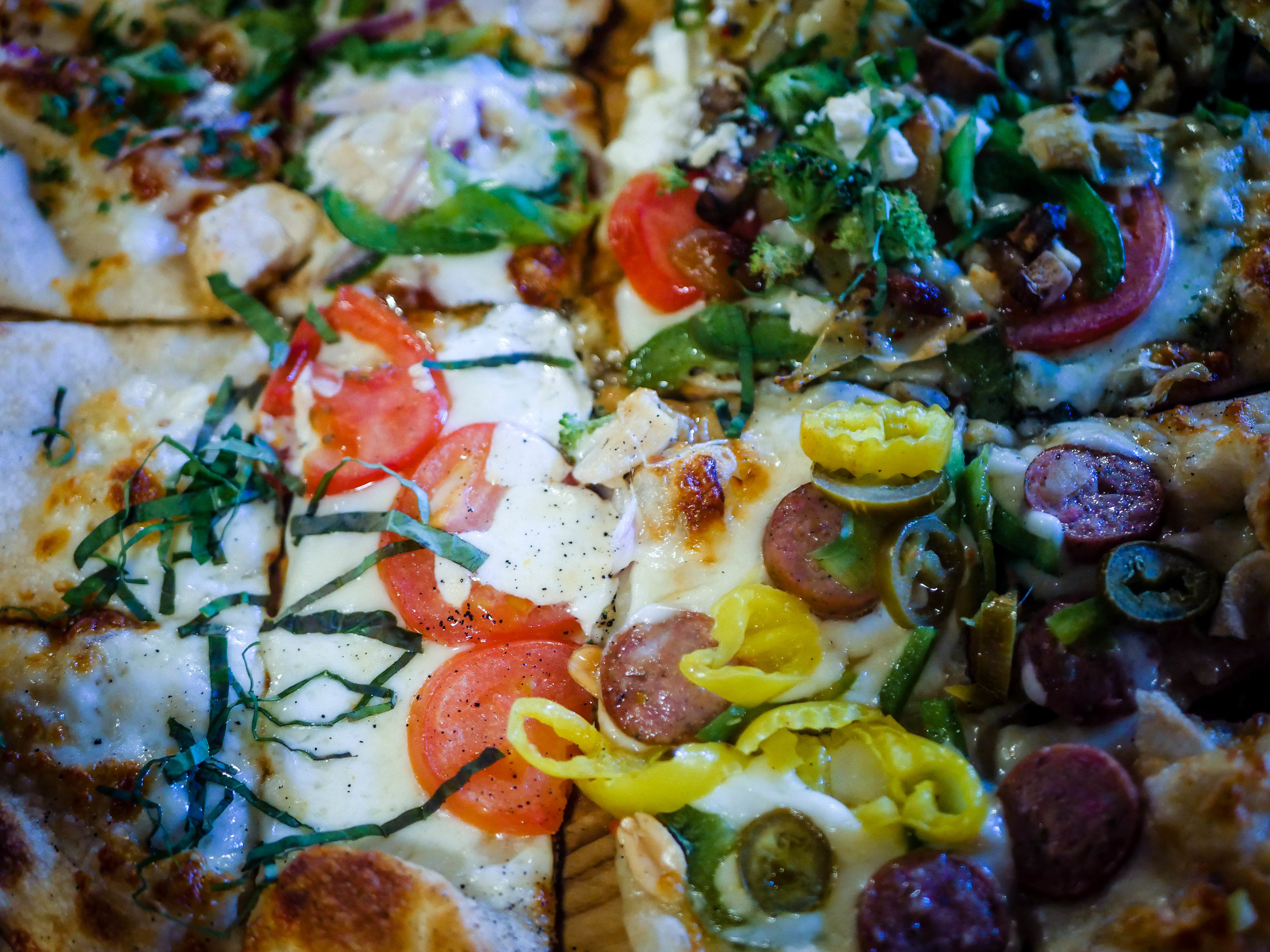Pizza flight from Mitten Brewing Company