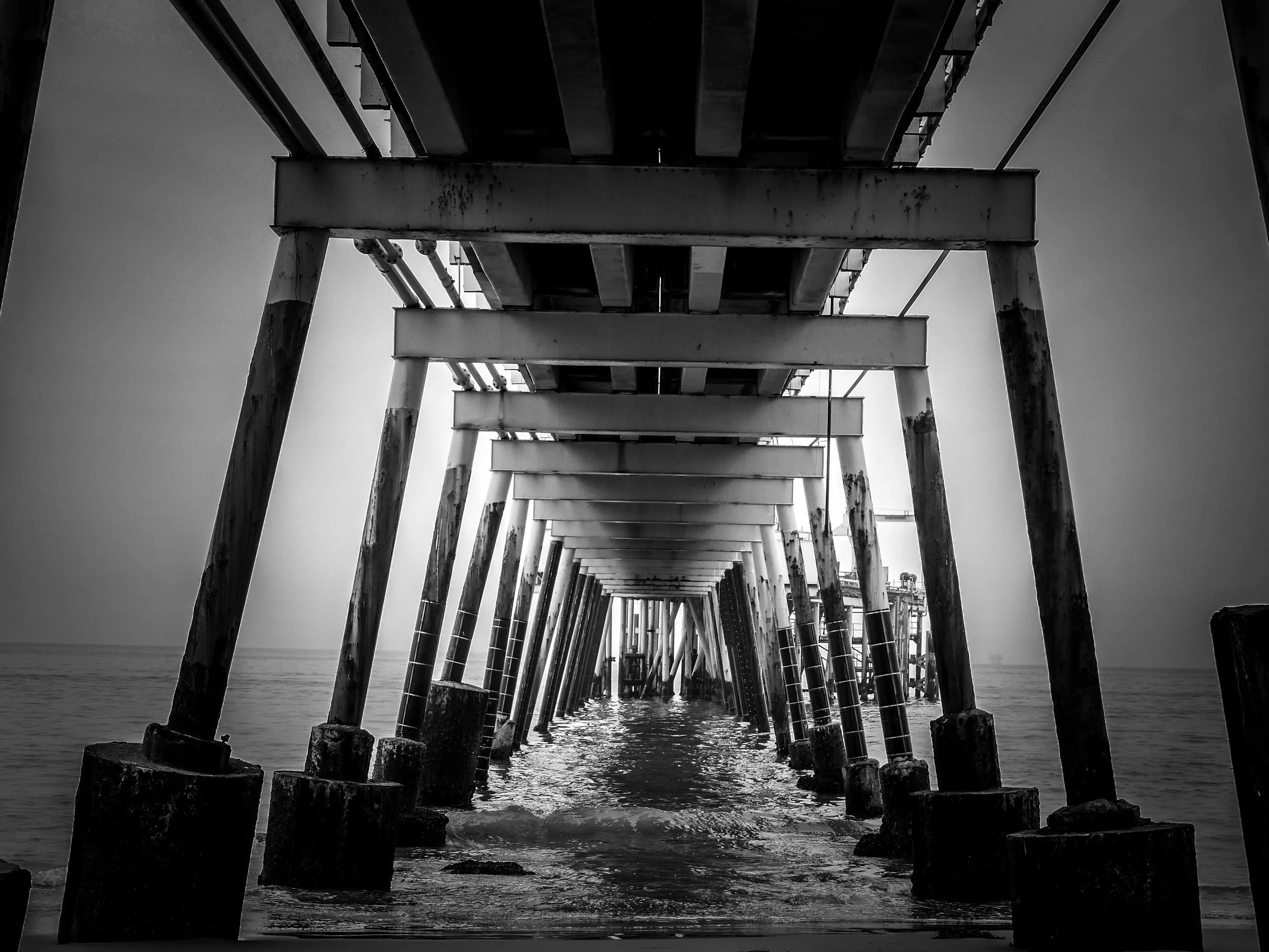 Oil derricks supply dock at Carpinteria State Beach.
