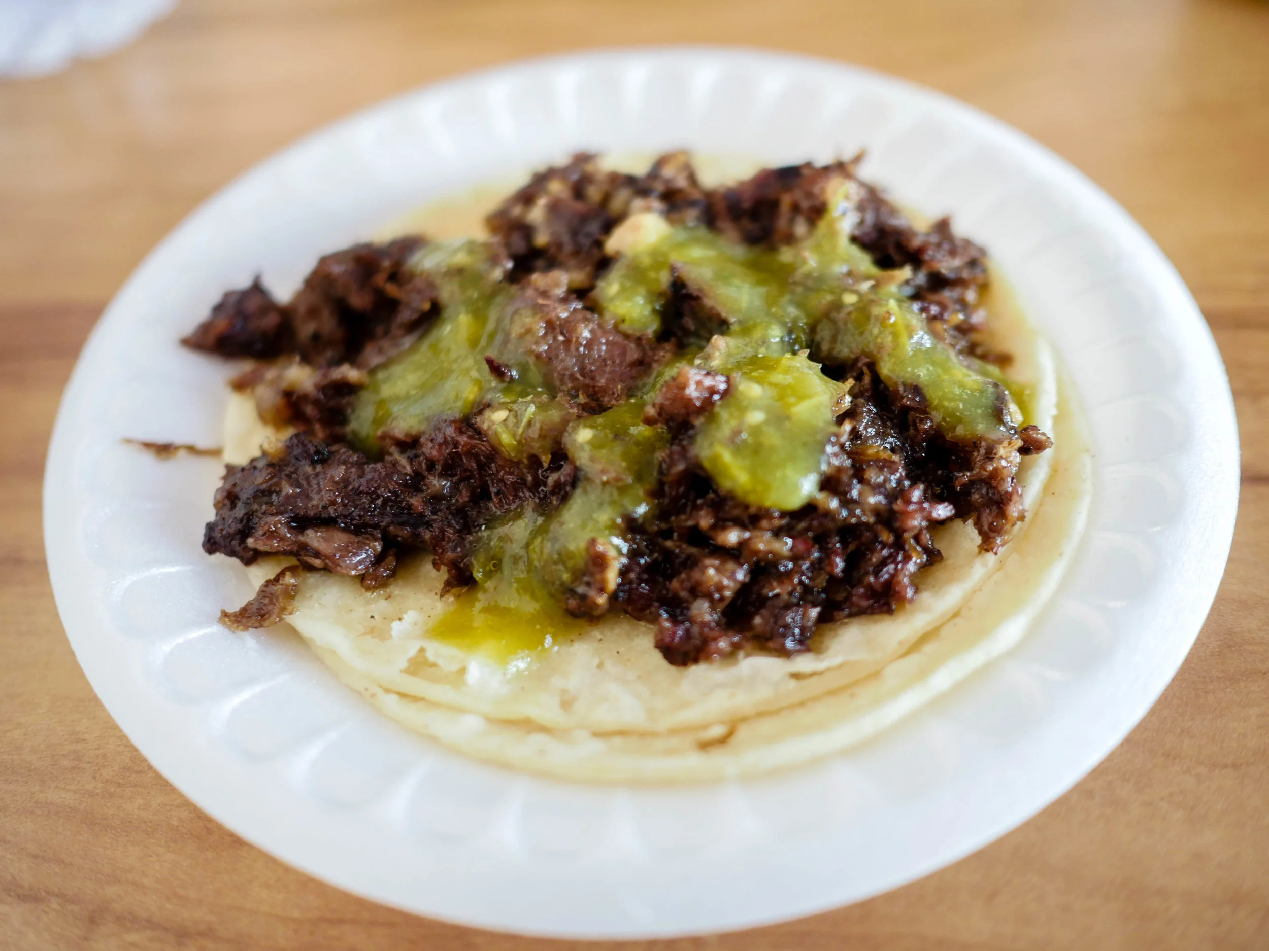 Cachete taco with salsa verde from Lilly's Taqueria