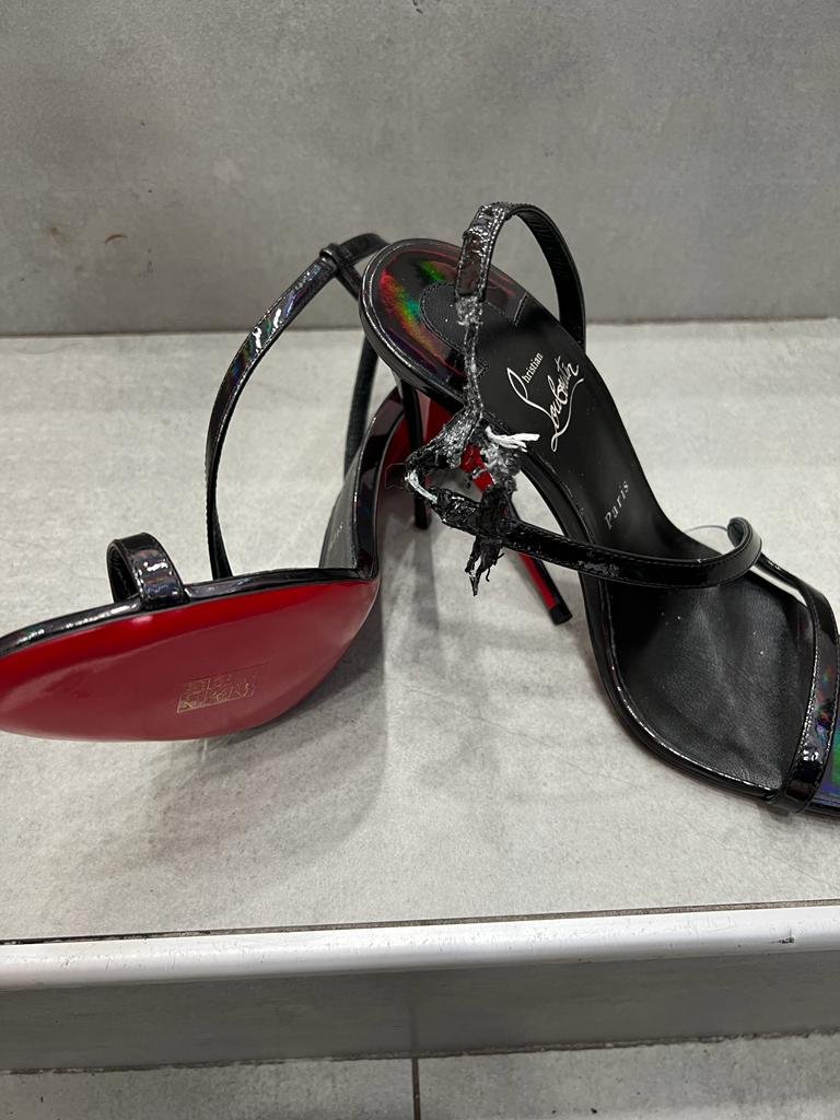 Christian Louboutin heels before repair