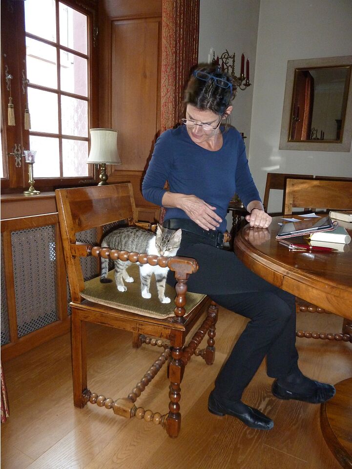 With her new family, in Switzerland