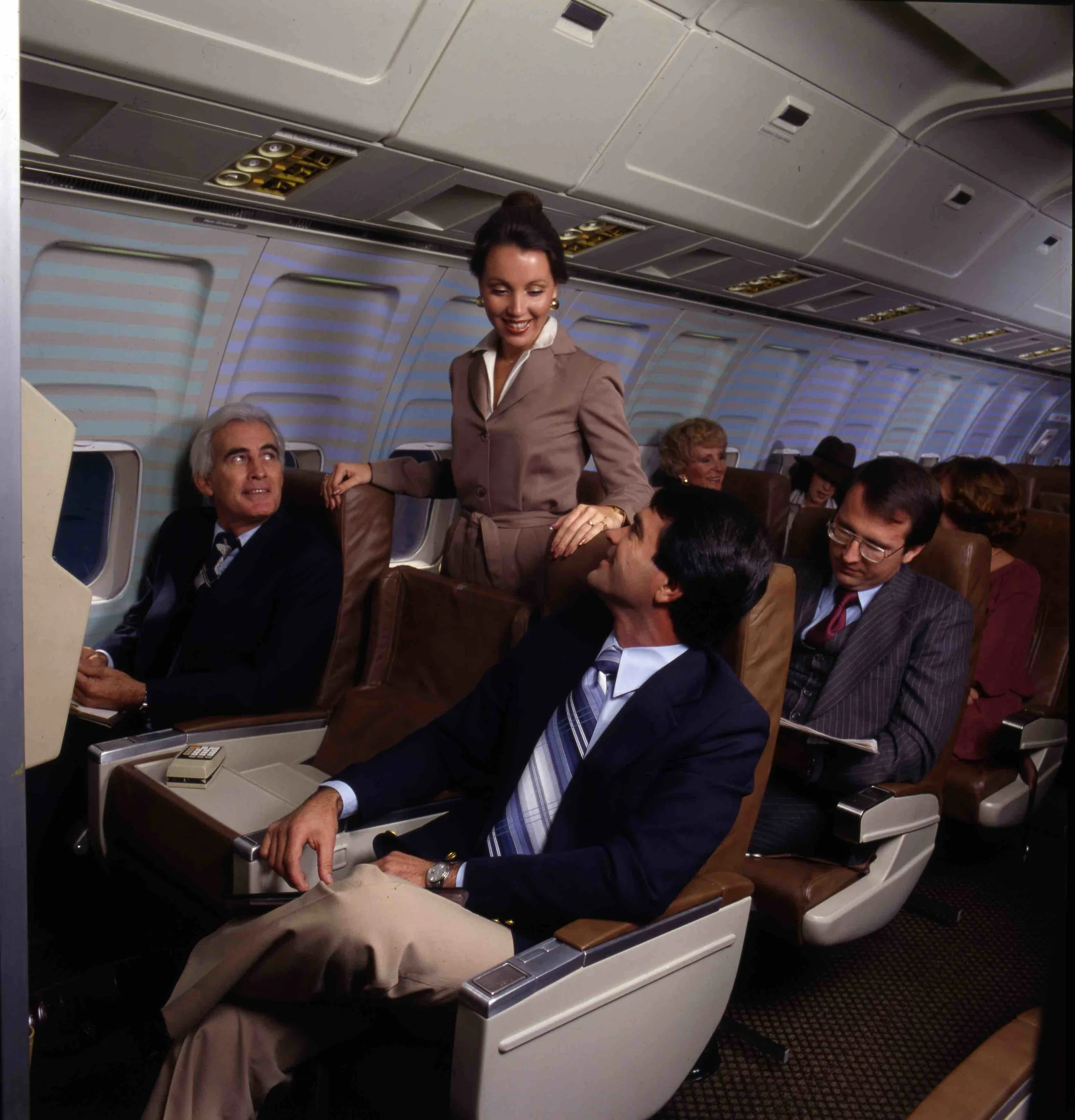 The Clean Lines of Braniff's New UltraSpace Interiors are Complemented by the Warmth of Halston Flight Attendant Uniforms