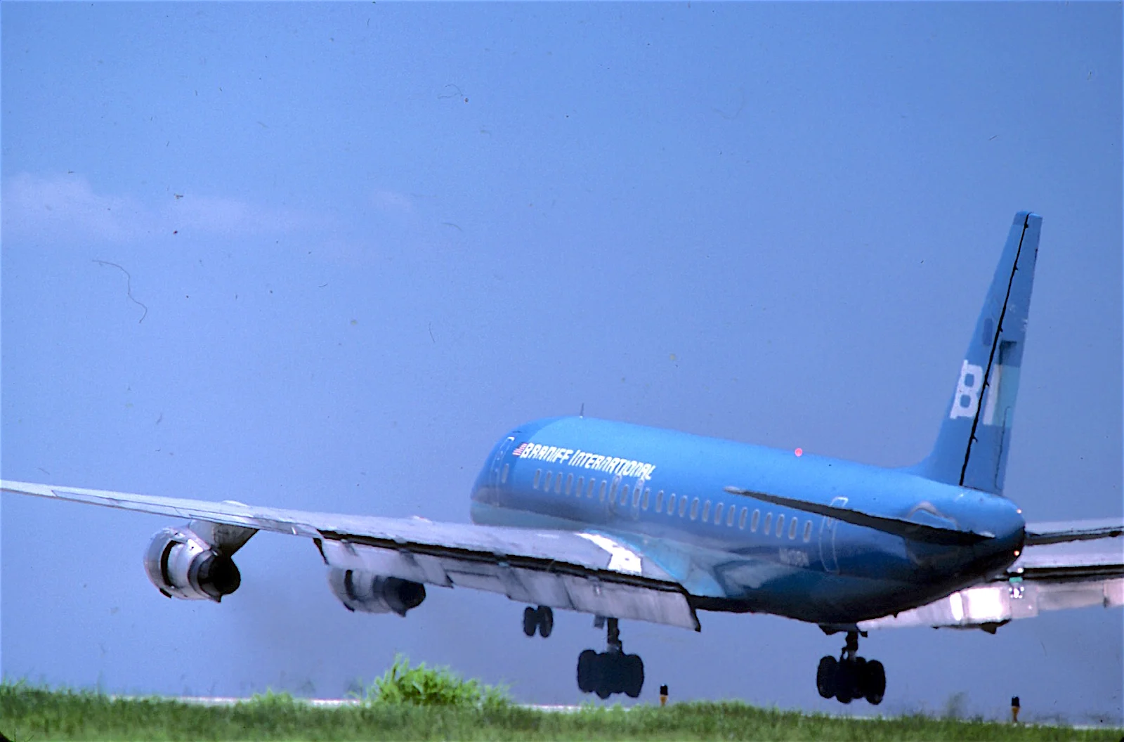 Braniff McDonnell-Douglas DC-8-51 is Arriving DFW Airport, Texas, in July 1979