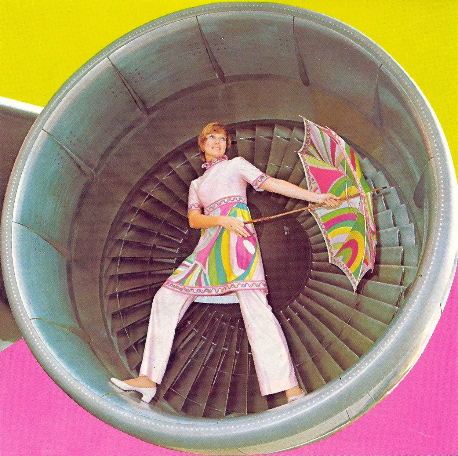 BI+747+Braniff+Place+Hostess+In+Engine+Pucci+1971+Pant+Dress+Collection+Umbrella+1970+Annual+Report+2.jpg