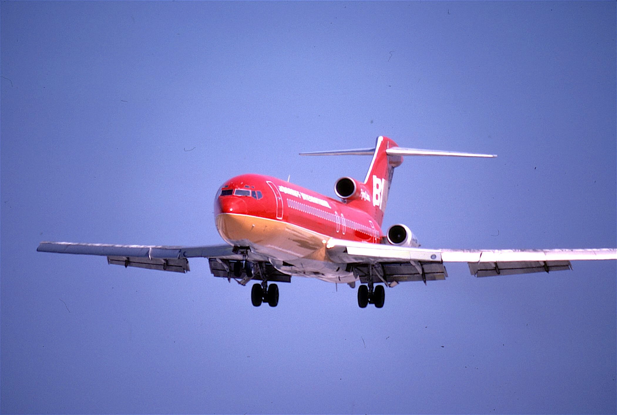 BI 727-200 Red Two Tone Landing DFW 1979.jpg