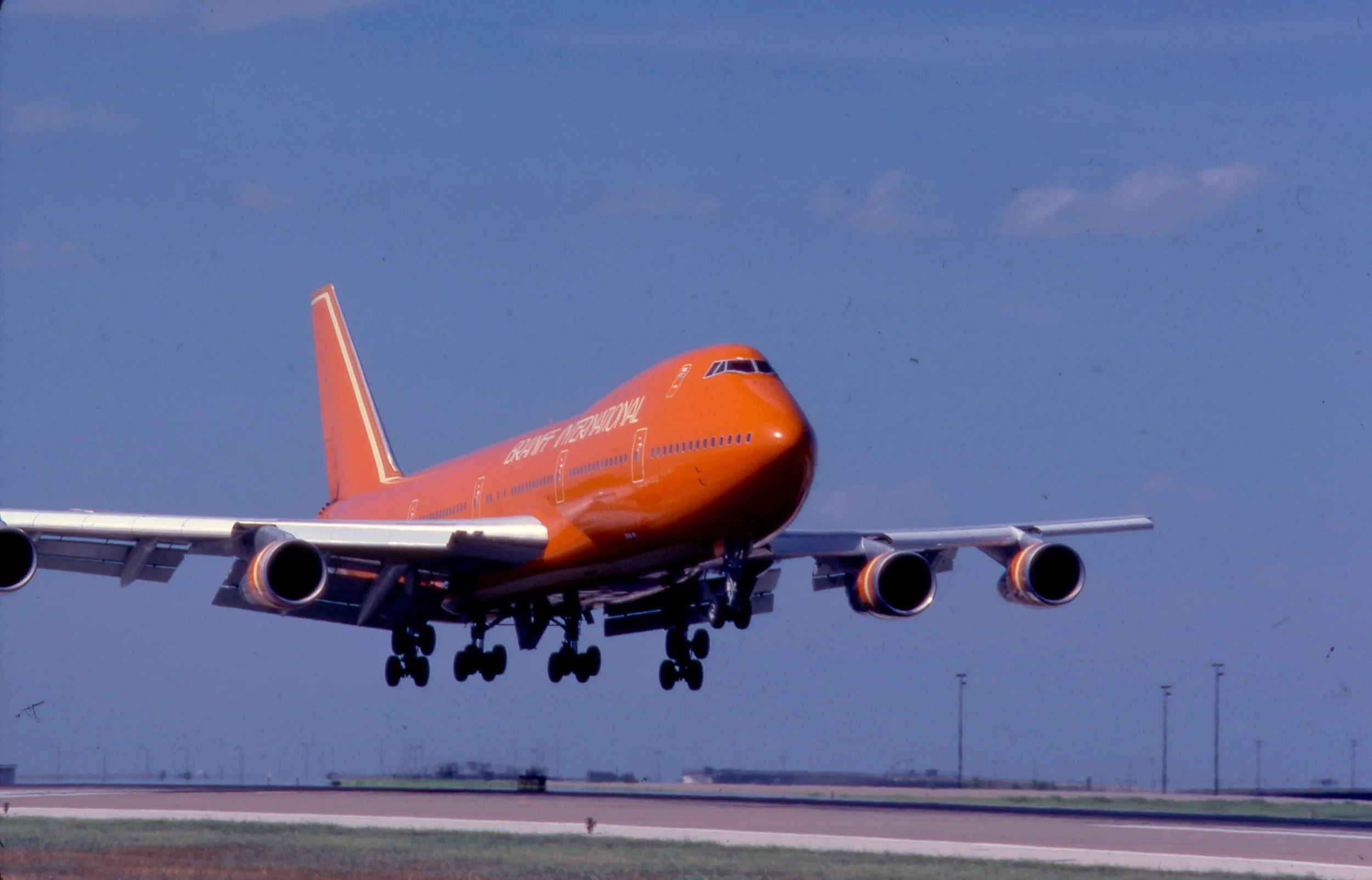 BI 747-230B N611BN Landing Orange Ultra DFW Jul 1979.jpg