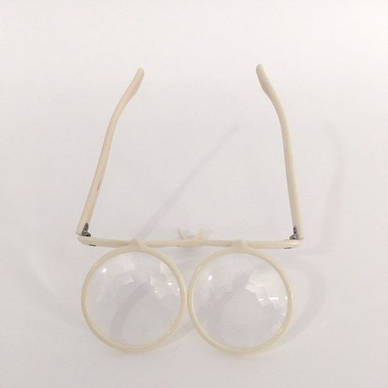 Vintage acrylic flip-eye glasses, found on Etsy