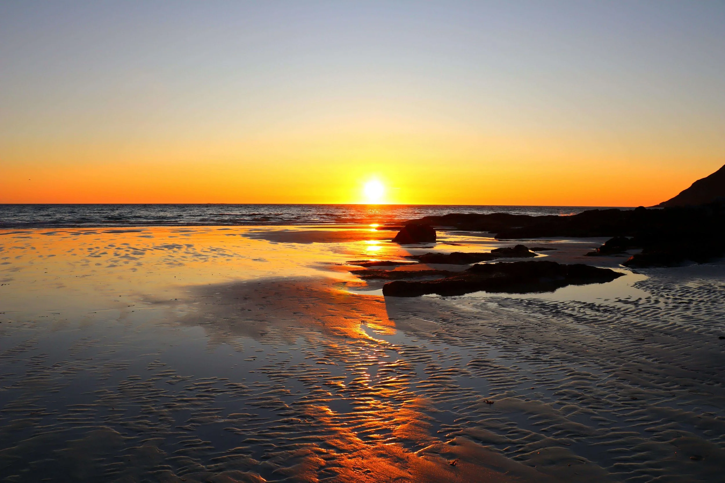 Beautiful sunset over the ocean at a Cape Cod beach