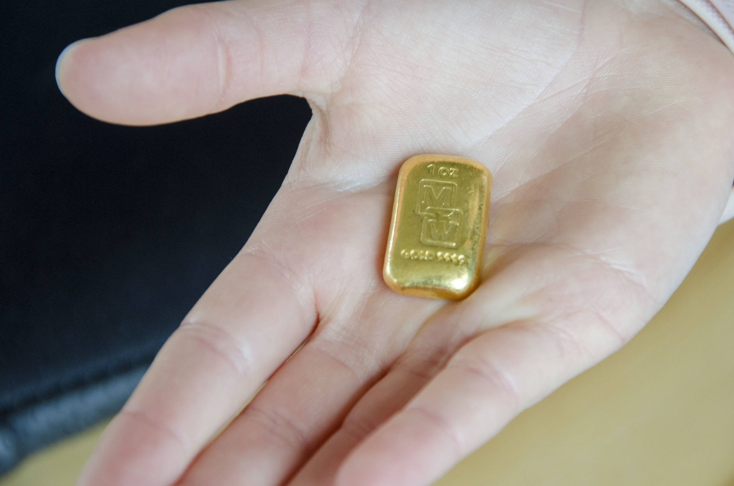 The gold ingot resting in my daughters 8 year old hand. Trying to make it look bigger!