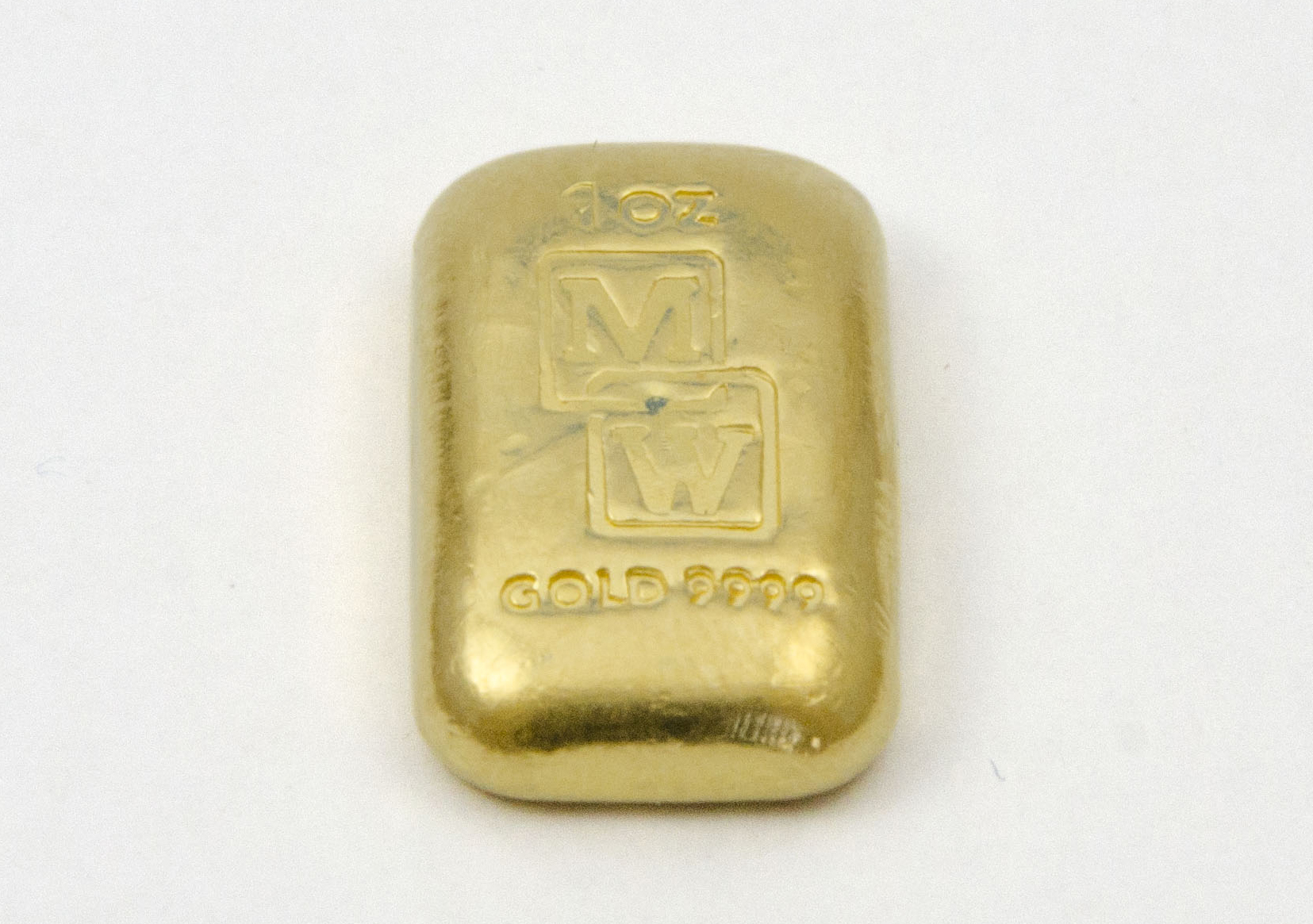 1oz Morris and Watson Cast Fine Gold i ngot (31.10 grams). Ingot dimensions (mm): 15(W) x 25(H) x 5(D)